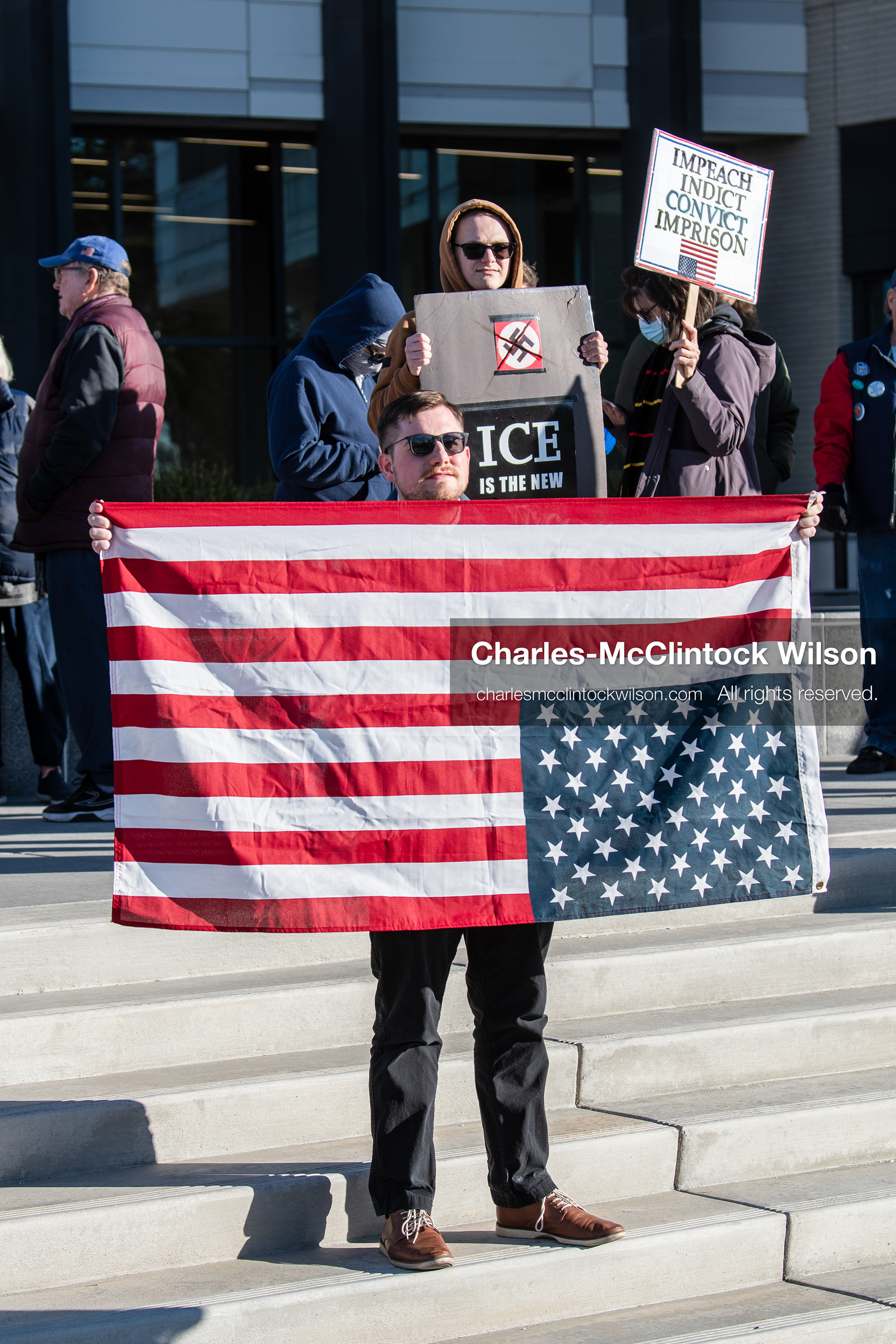 January 20, 2026, Provo, Utah, USA: A protester displays an upside down American flag and a sign opposing ICE during the Free America Walkout outside Provo City Hall in Provo Utah on January 20 2026. The nationwide protest called for justice immigration reform and an end to detention practices. (Credit Image: © Charles-McClintock Wilson/ZUMA Press Wire)