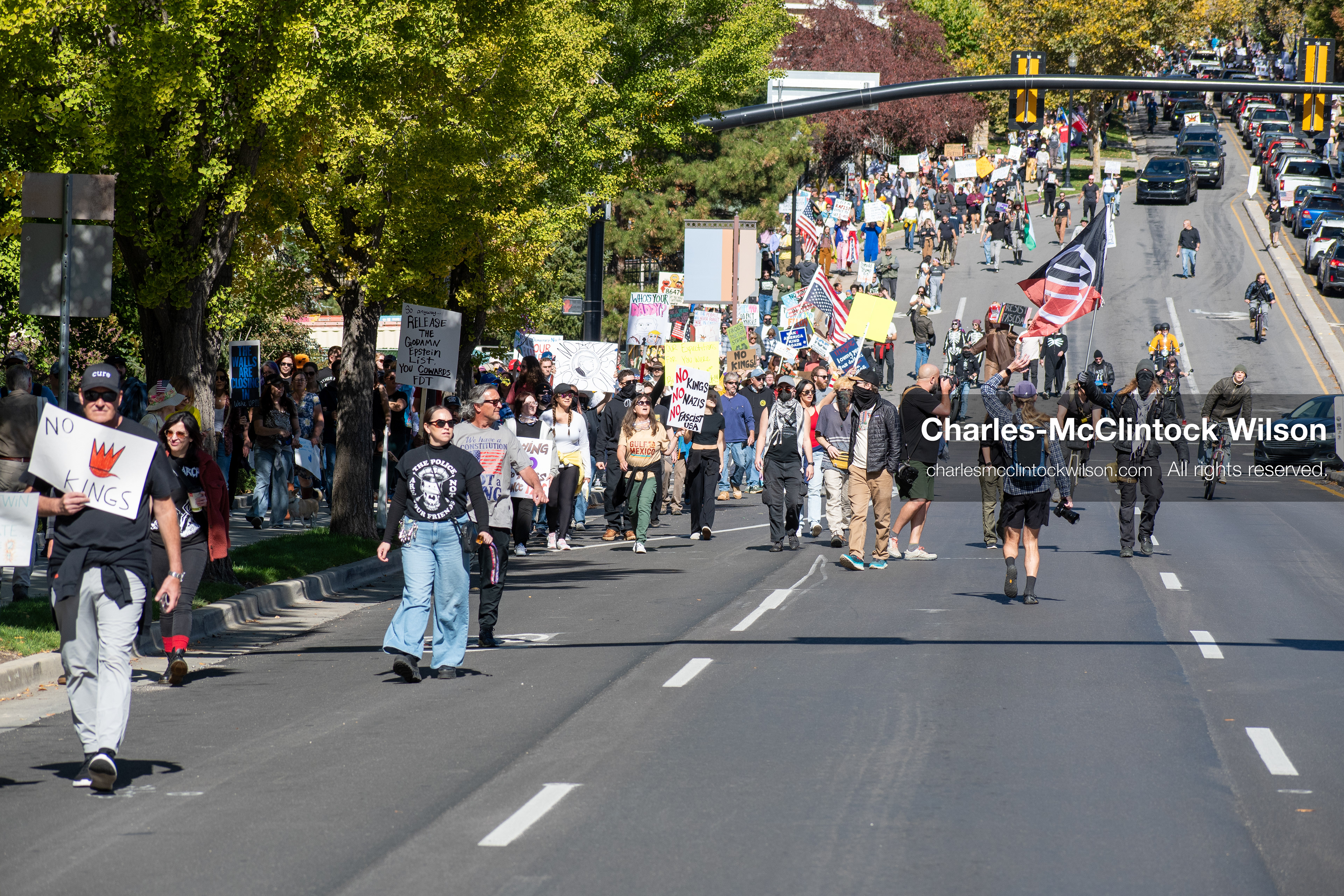 October 18, 2025, Salt Lake City, Utah, USA: Demonstrators march along South State Street during a "No Kings" protest in Salt Lake City, Utah. The protest was part of a nationwide mobilization.