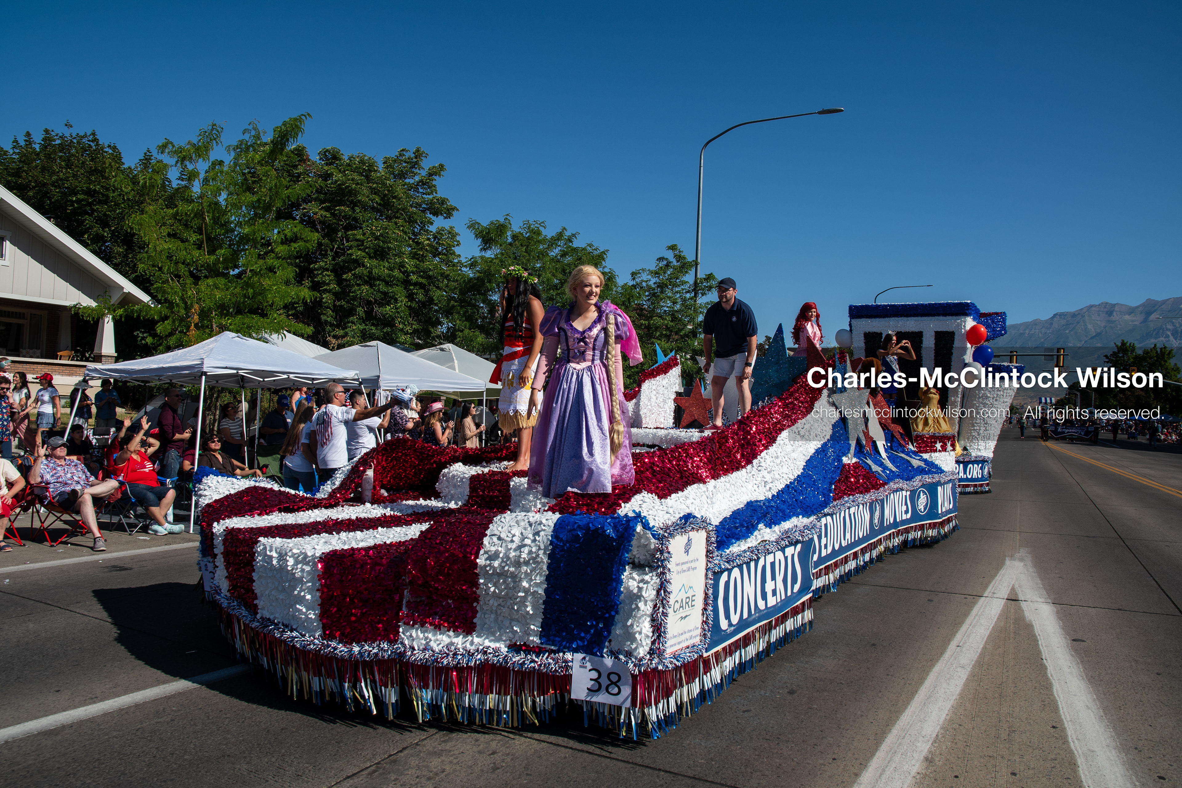 July 4, 2026, Provo, Utah, USA: A performer dressed as a princess waves to onlookers from a red, white, and blue themed parade float during America's Freedom Festival Grand Parade in Provo, Utah, Saturday, July 4, 2026. The annual Independence Day event features expanded programming to honor the 250th anniversary of United States independence. (Credit Image: © Charles-McClintock Wilson/ZUMA Press Wire)