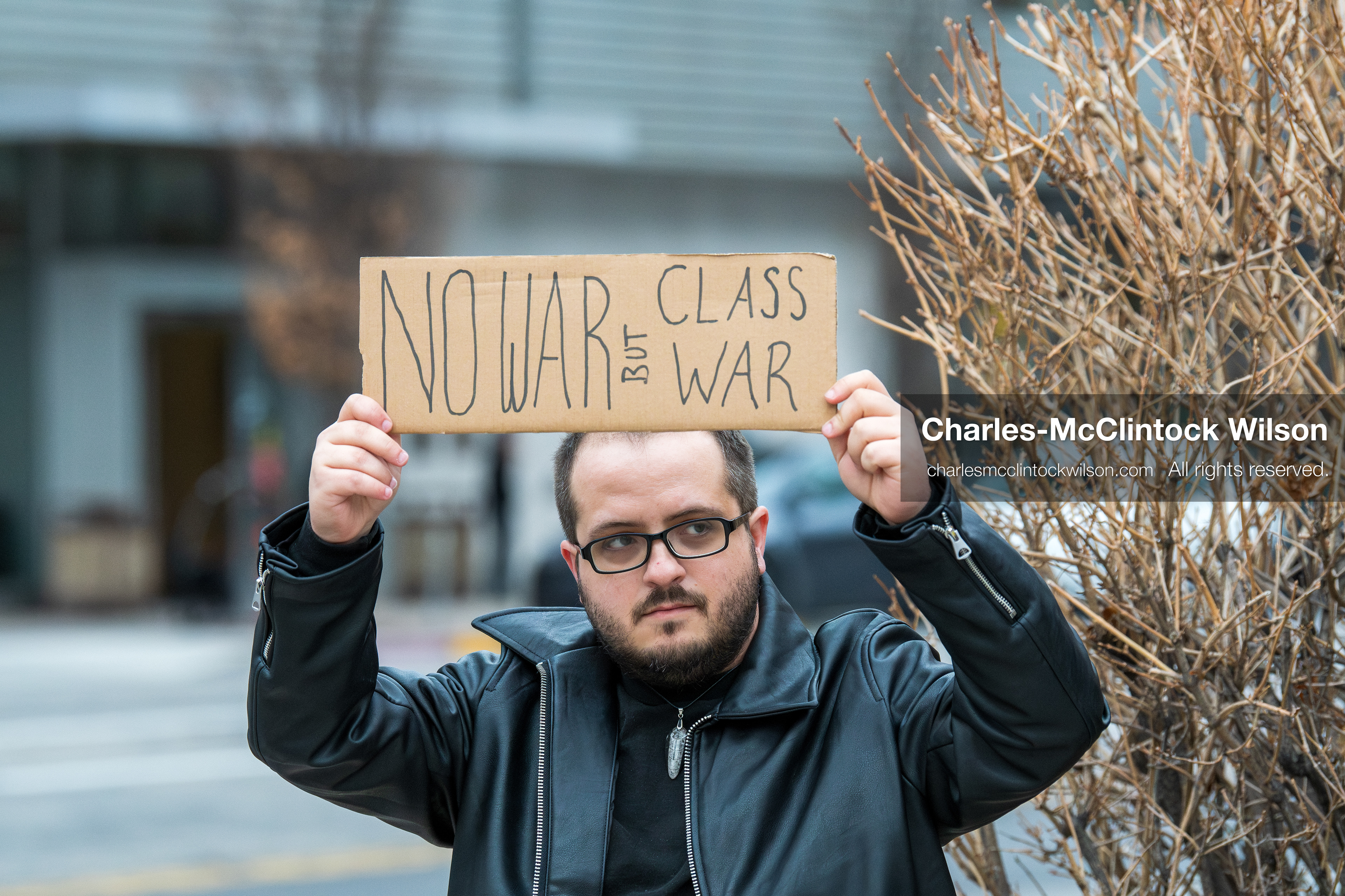 January 3, 2026, Salt Lake City, Utah, USA: A protester holds a sign during a demonstration against US action in Venezuela outside the Wallace Federal Building in Salt Lake City, Utah. The protest was part of a nationwide mobilization responding to recent military developments. (Credit Image: (c) Charles‑McClintock Wilson/ZUMA Press Wire)