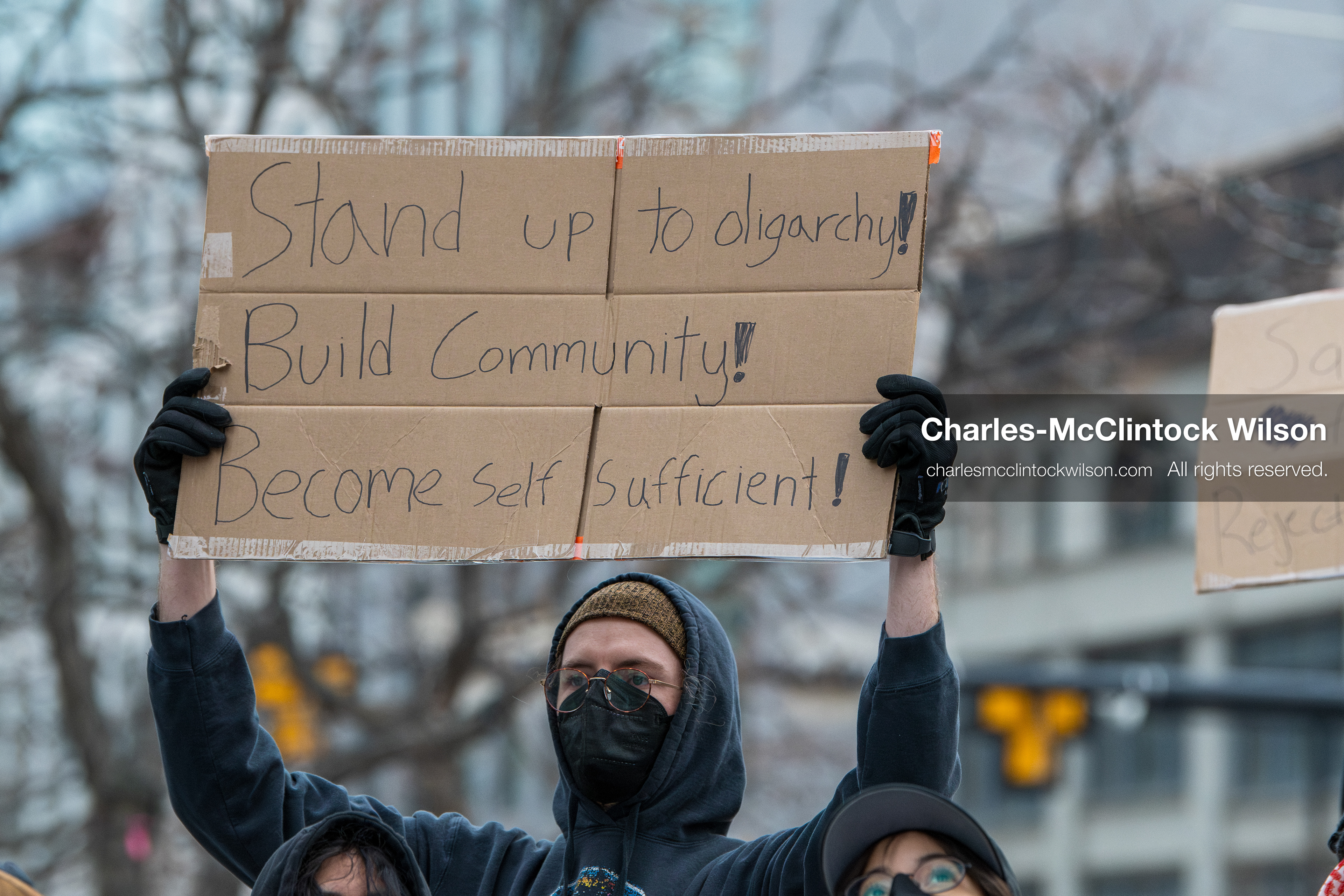 January 3, 2026, Salt Lake City, Utah, USA: A protester holds a sign during a demonstration against US action in Venezuela outside the Wallace Federal Building in Salt Lake City, Utah. The protest was part of a nationwide mobilization responding to recent military developments. (Credit Image: (c) Charles‑McClintock Wilson/ZUMA Press Wire)