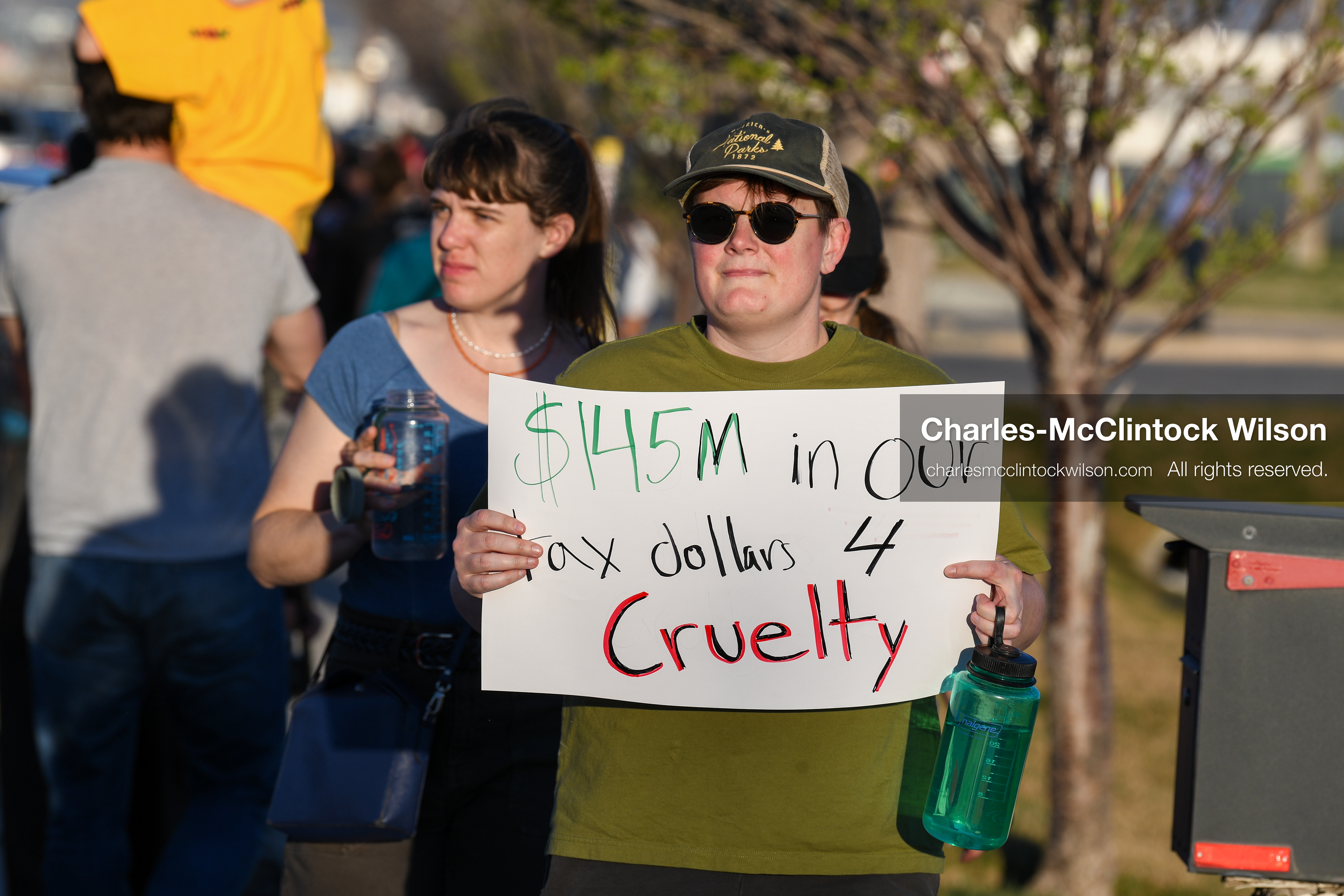 March 18, 2026, Salt Lake City, Utah, USA: A protester holds a sign during a demonstration at the site of a proposed ICE detention facility on the west side of Salt Lake City. Demonstrators gathered near the warehouse property as part of an ongoing community response to the planned facility. (Credit Image: © Charles McClintock Wilson/ZUMA Press Wire)