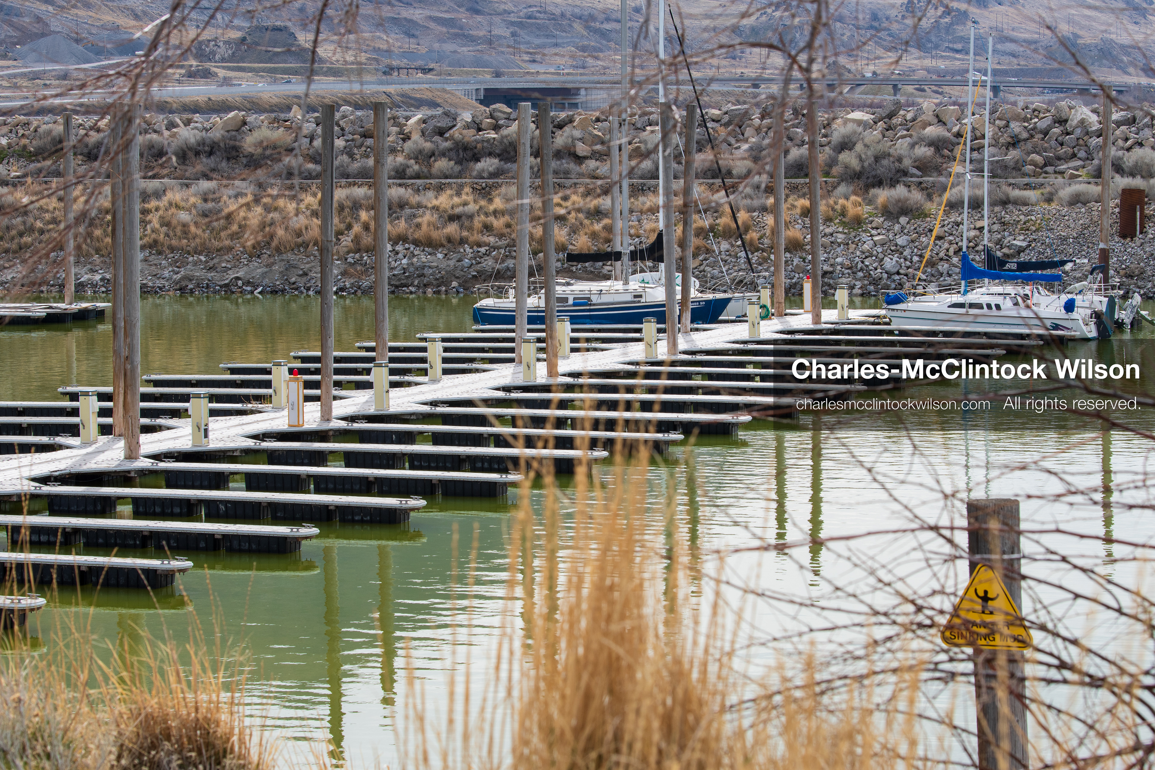 March 1, 2026, Great Salt Lake, Utah, USA: Sailboats sit docked in a marina at the Great Salt Lake as the region continues to experience historically low water levels. Reports from state officials and the Great Salt Lake Strike Team state that the lake remains in a serious adverse‑effects range, with elevations among the lowest recorded in more than one hundred years. The lake has drawn increased public attention as lawmakers consider large‑scale water projects and long‑term plans to address declining conditions. (Credit Image: © Charles‑McClintock Wilson/ZUMA Press Wire)
