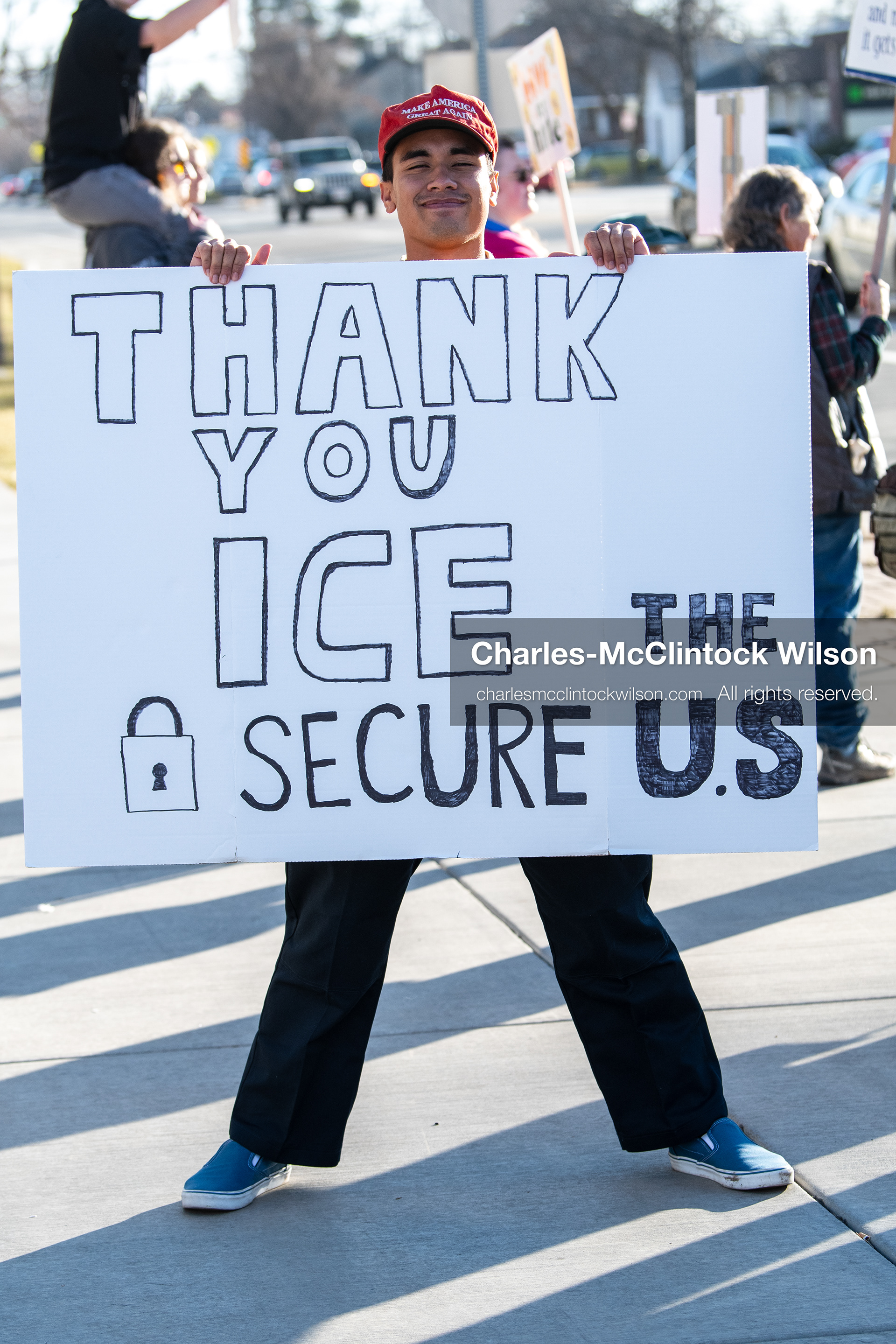 January 20, 2026, Provo, Utah, USA: A demonstrator wearing a Make America Great Again hat holds a sign supporting ICE during the Free America Walkout outside Provo City Hall in Provo Utah on January 20 2026. The individual expressed support for US president Donald Trump. The nationwide protest drew participants with varied political views. (Credit Image: © Charles-McClintock Wilson/ZUMA Press Wire)