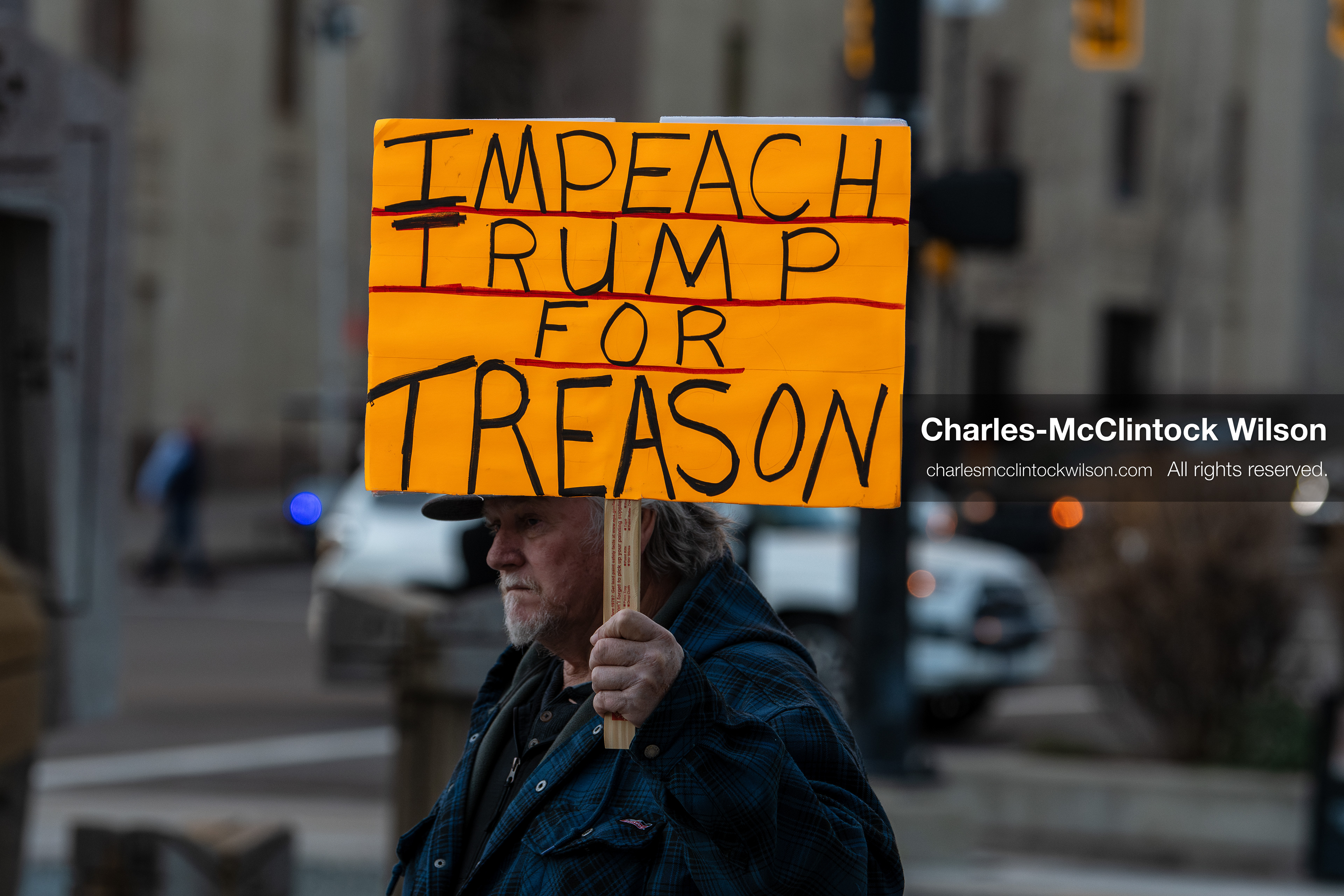 January 5, 2026, Salt Lake City, Utah, USA: A demonstrator holds a sign during a protest outside the Wallace Federal Building in Salt Lake City, Utah. The rally, organized by Salt Lake Indivisible, called for congressional limits on presidential war powers following recent US military actions in Venezuela involving the government of Nicolas Maduro. (Credit Image: (c) Charles‑McClintock Wilson/ZUMA Press Wire)
