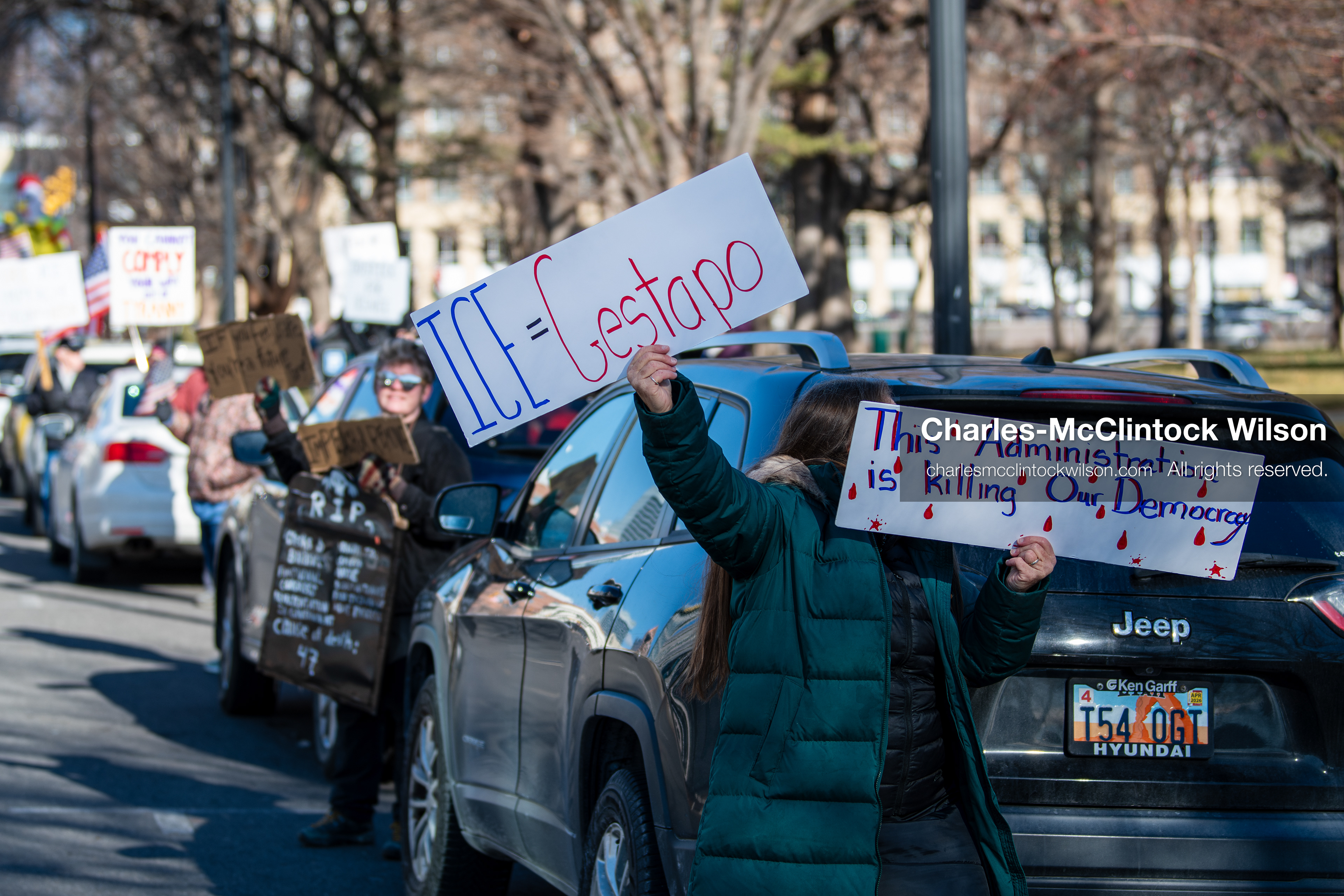 Salt Lake City, Utah, January 10, 2026: Protesters stand with signs at Washington Square Park during the ICE Out for Good protest, a demonstration calling for justice for Renee Nicole Good. (Credit Image: © Charles‑McClintock Wilson/ZUMA Press Wire)