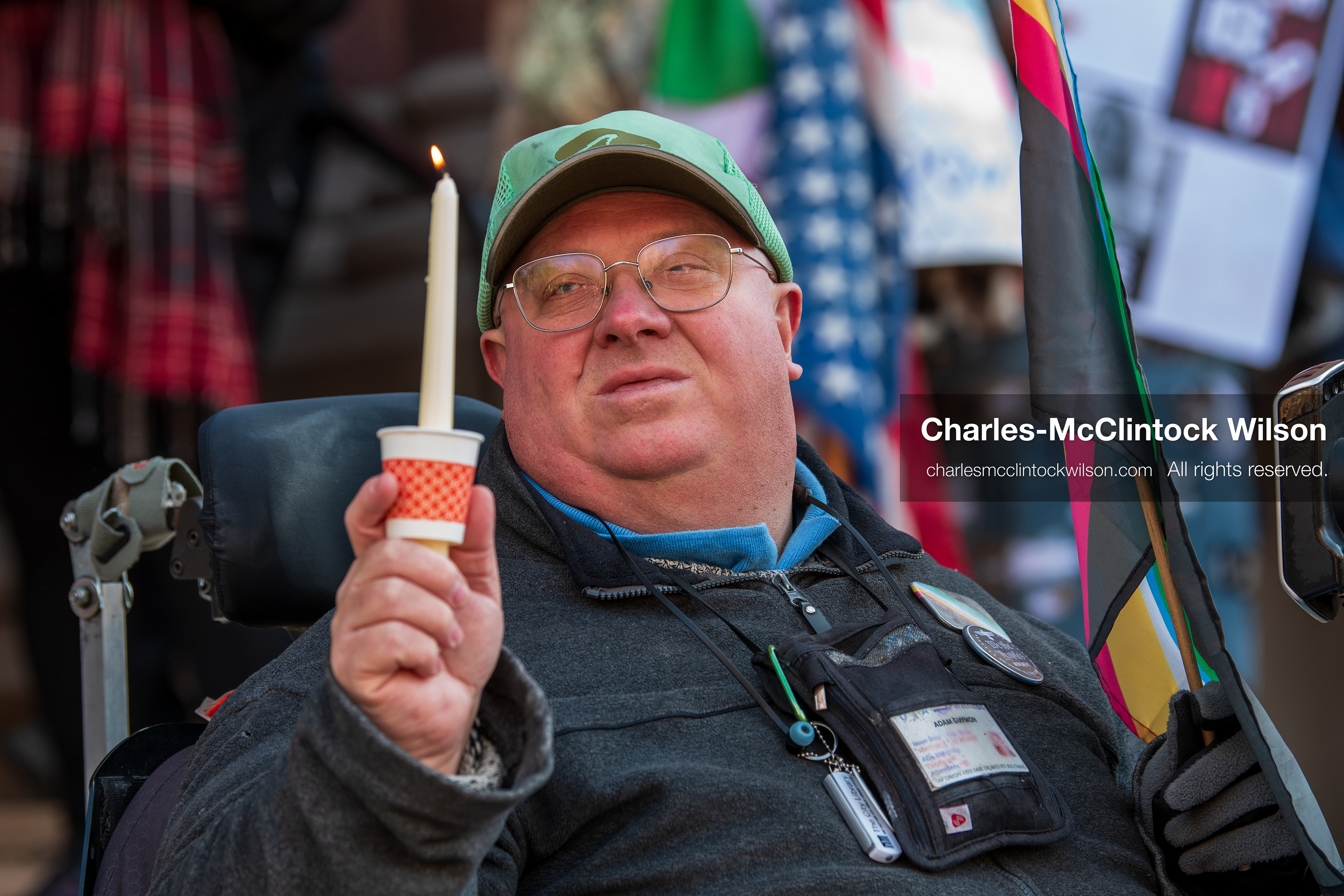 Salt Lake City, Utah, January 10, 2026: A man holds a candle during a vigil for Renee Nicole Good and other victims who died during ICE enforcement, part of the ICE Out for Good protest at Washington Square Park. (Credit Image: © Charles‑McClintock Wilson/ZUMA Press Wire)