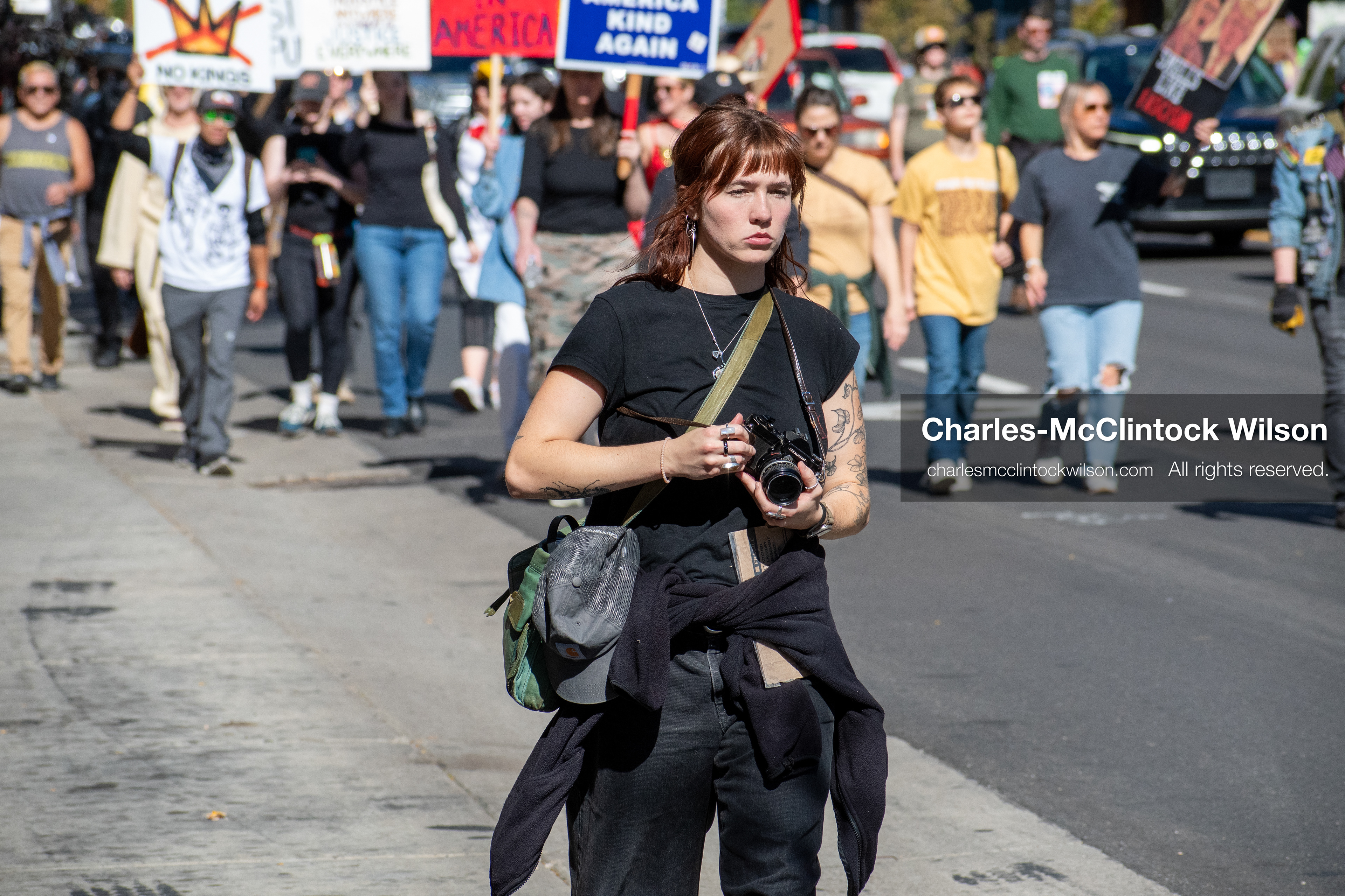 October 18, 2025, Salt Lake City, Utah, USA: Demonstrators march along South State Street during a "No Kings" protest in Salt Lake City, Utah. The protest was part of a nationwide mobilization.