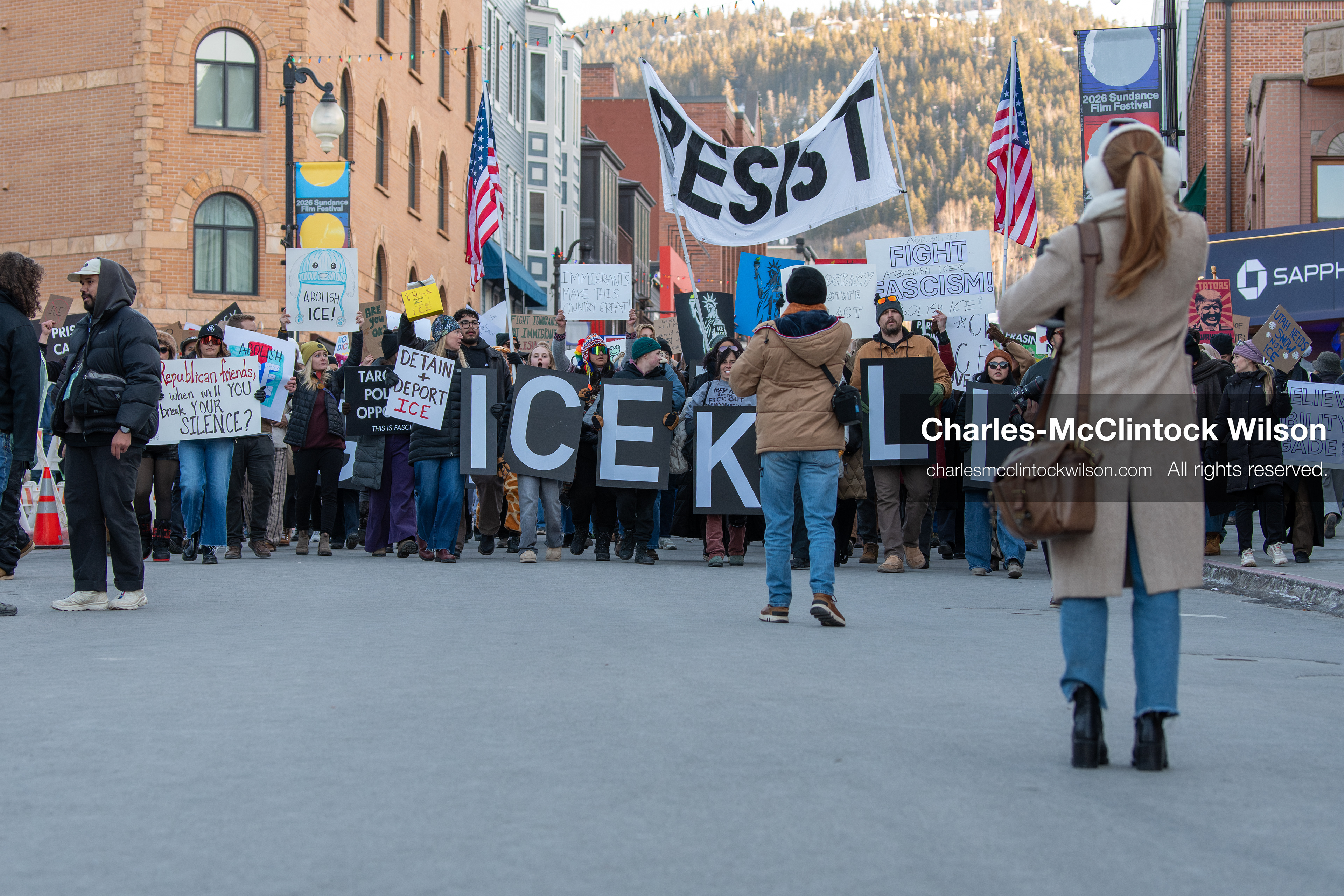 January 26, 2026, Park City, Utah, USA: Demonstrators march through Main Street holding signs during a protest opposing U.S. Immigration and Customs Enforcement (I.C.E.) ICE agents at the Sundance Film Festival in Park City, Utah, on Monday, Jan. 26, 2026. The event was held in response to the fatal shooting of Alex Pretti by a U.S. Border Patrol officer in Minneapolis. (Credit Image: © Charles McClintock Wilson/ZUMA Press Wire)