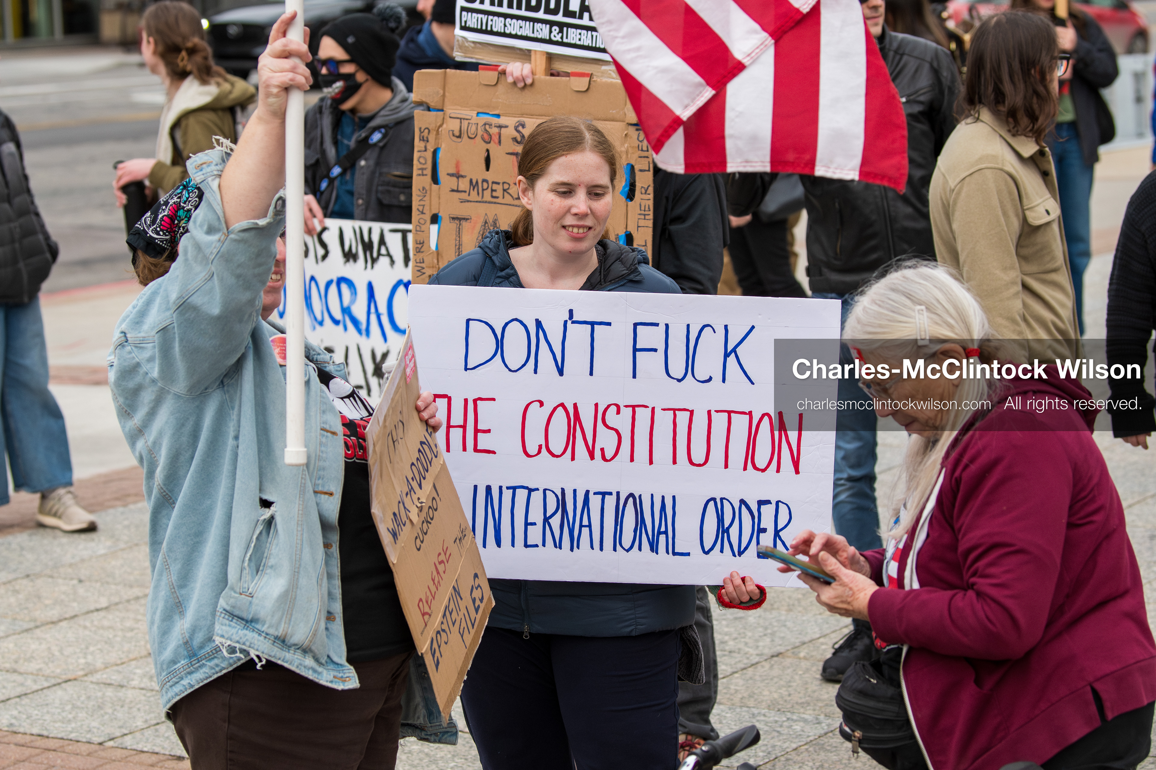 January 3, 2026, Salt Lake City, Utah, USA: Protesters hold signs during an emergency demonstration against US action in Venezuela outside the Wallace Federal Building in Salt Lake City, Utah. The event was part of a nationwide mobilization responding to recent military developments. (Credit Image: (c) Charles‑McClintock Wilson/ZUMA Press Wire)
