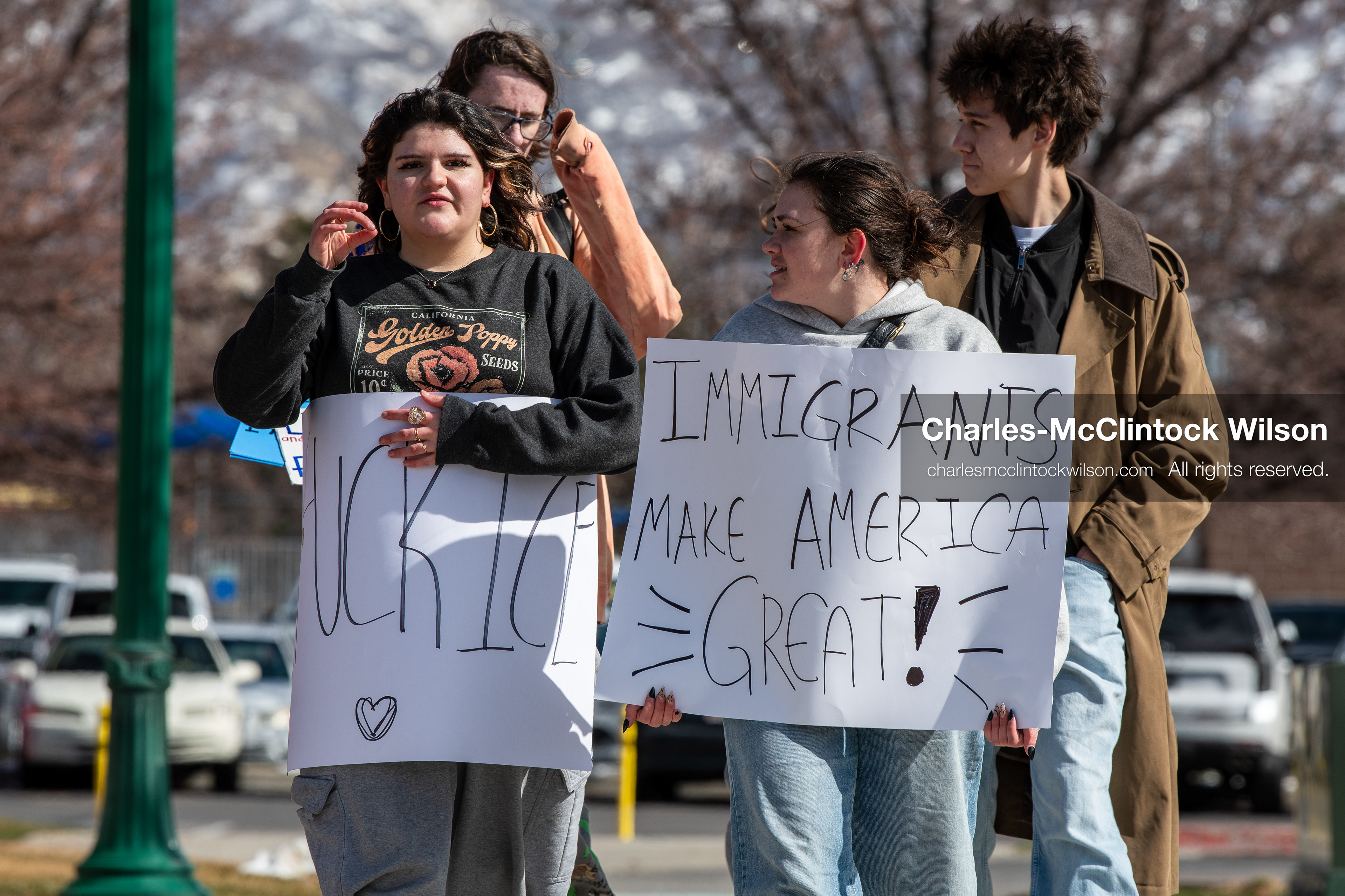 February 20, 2026, Orem, Utah, USA: Participants walk together during a student led protest against ICE in front of Orem City Hall. Some carry signs as the group moves along State Street during the event. (Credit Image: © Charles McClintock Wilson/ZUMA Press Wire)