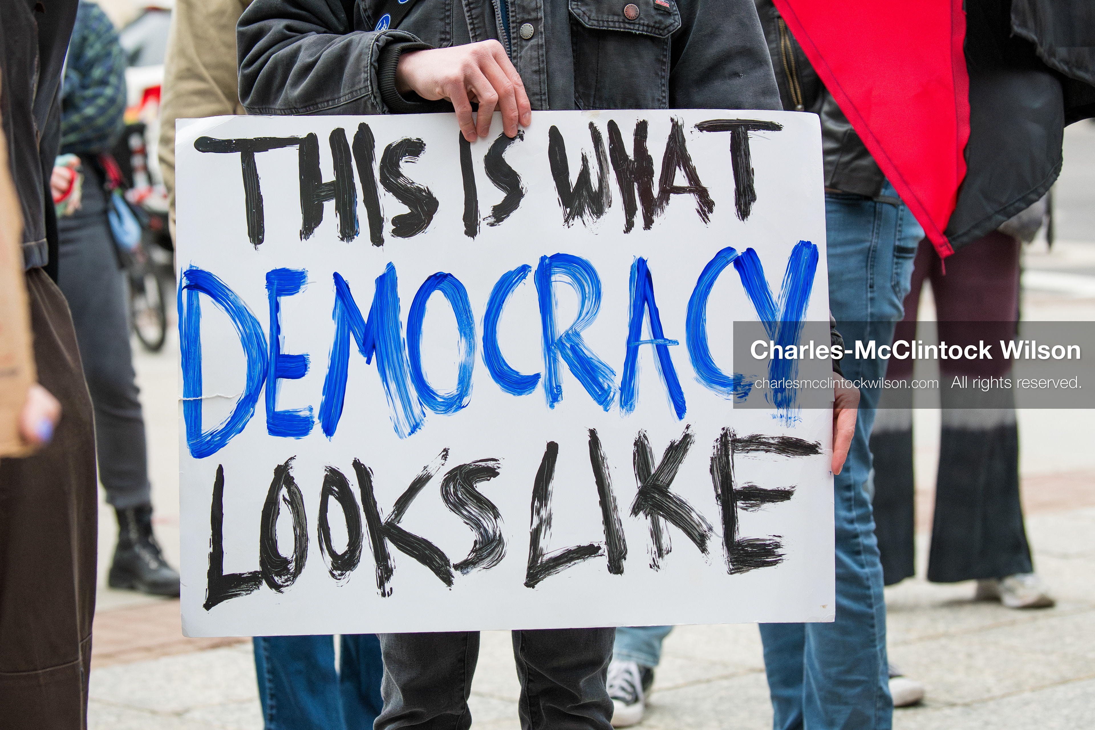 January 3, 2026, Salt Lake City, Utah, USA: A protester holds a sign during a demonstration against US action in Venezuela outside the Wallace Federal Building in Salt Lake City, Utah. The protest was part of a nationwide mobilization responding to recent military developments. (Credit Image: (c) Charles‑McClintock Wilson/ZUMA Press Wire)
