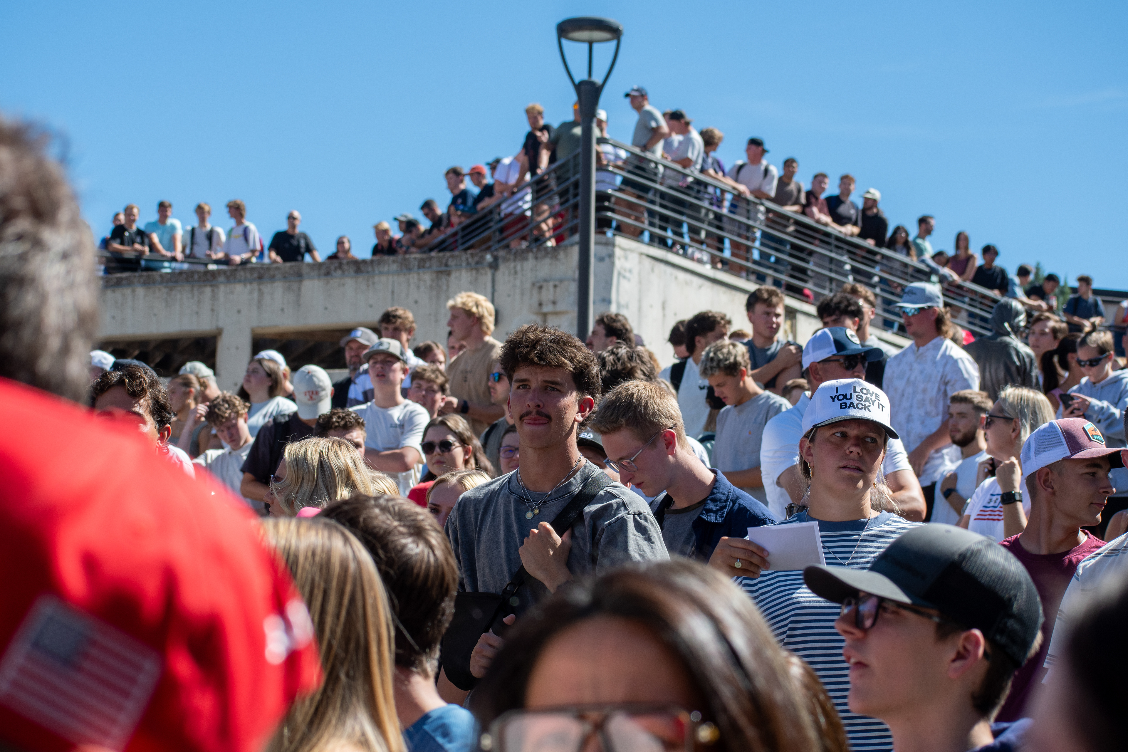 OREM, UTAH – SEPTEMBER 10, 2025: Attendees gather in close formation at Utah Valley University for the opening stop of the American Comeback Tour. The image captures a moment of shared anticipation and civic presence, reflecting the energy, emotion, and communal engagement that defined the event’s intended spirit. © Charles-McClintock Wilson / ZUMA Press