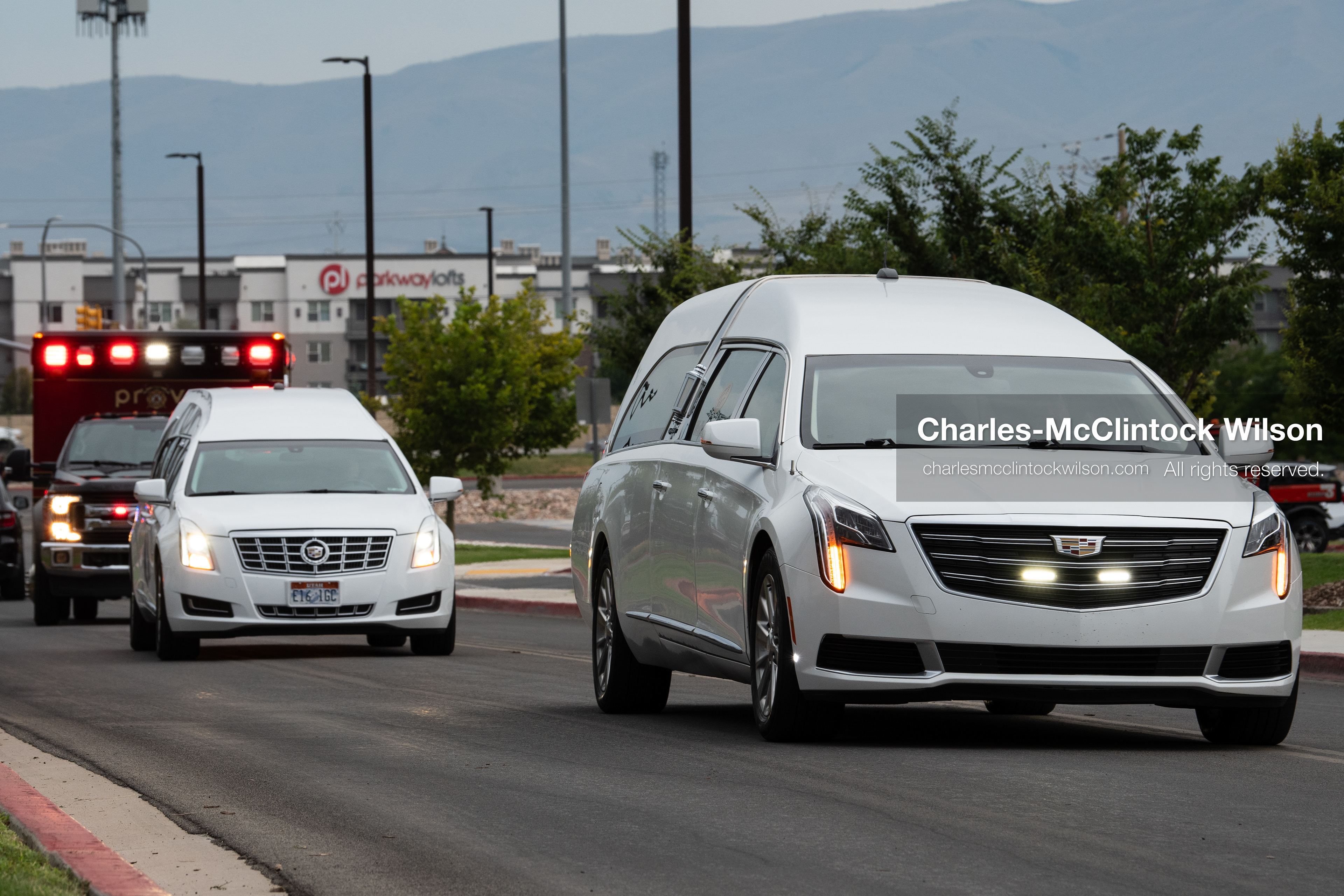 A Provo Fire Department engine and a motorcade of white hearses arrive at the UCCU Center at Utah Valley University in Orem, Utah, on Wednesday, July 29, 2026. The vehicle escort arrived ahead of a public memorial ceremony drawing community members and emergency personnel to honor five members of the Long family who died in a southern Utah flash flood. (Photo by Charles-McClintock Wilson/Sipa USA)