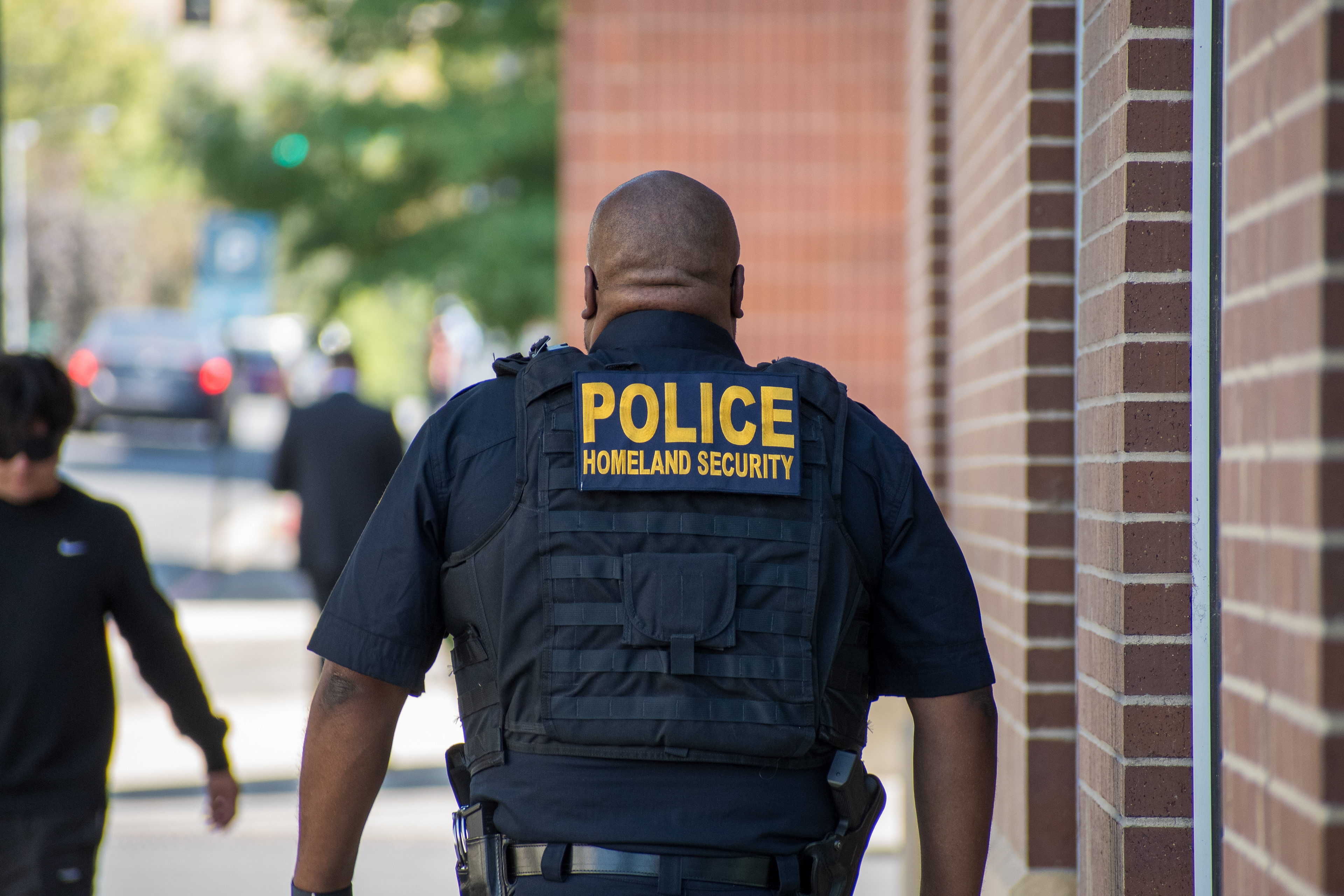 September 15, 2025 – Provo, Utah, United States: A Homeland Security police officer walks near the Utah Valley Convention Center during a Department of Homeland Security career expo focused on recruiting law enforcement and security personnel. Photograph by Charles‑McClintock Wilson / ZUMA Press Wire