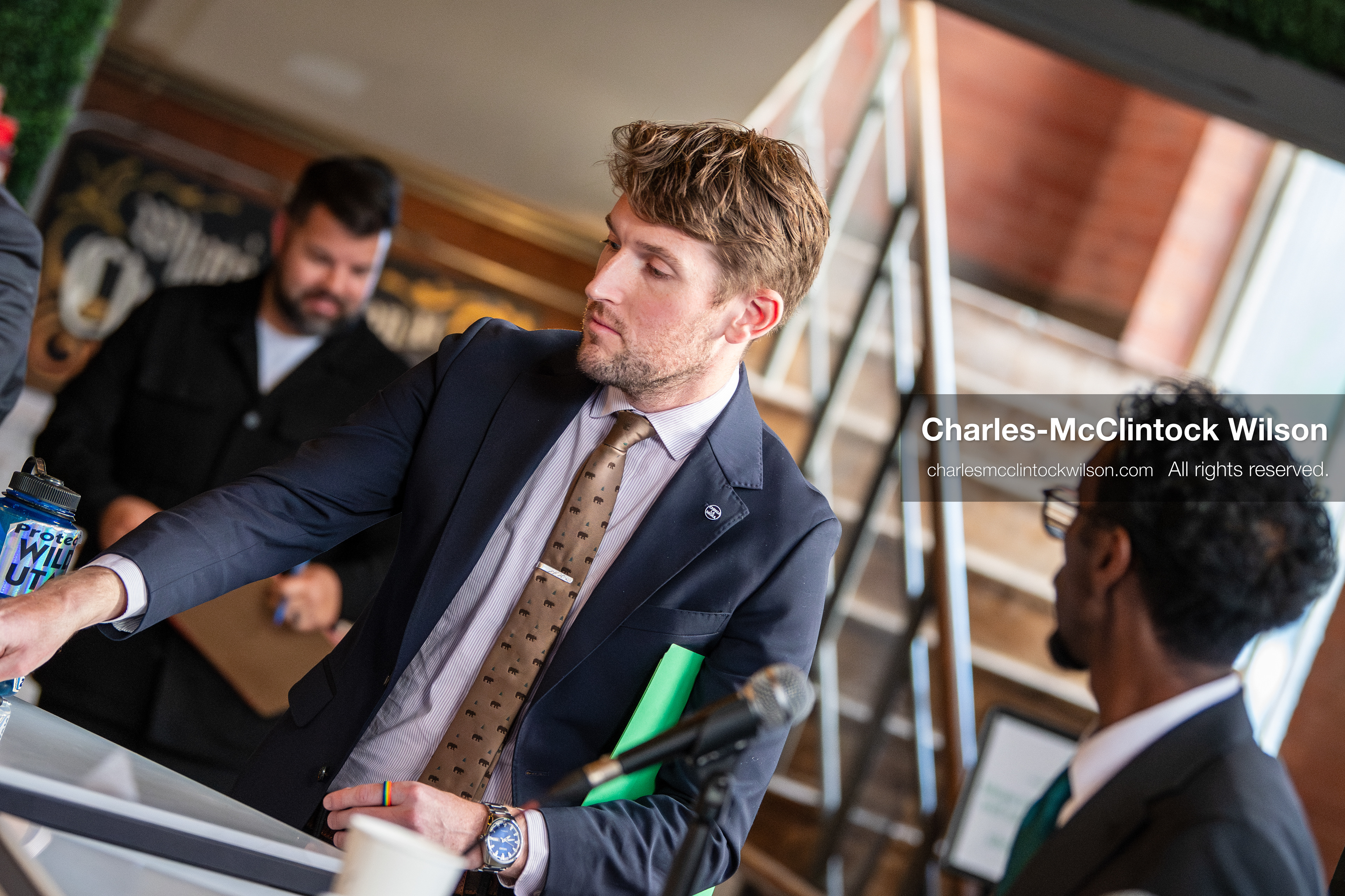April 22, 2026, Salt Lake City, Utah, USA: Utah state senator NATE BLOUIN, a candidate for the Democratic nomination in the Utah 1st Congressional District, prepares at the table before speaking during the Earth Day 1st District Candidate Debate at Church and State Marketplace in Salt Lake City. The event, hosted by Stewardship Utah, brought together candidates to discuss environmental and policy issues ahead of the 2026 election. (Credit Image: © Charles-McClintock Wilson/ZUMA Press Wire)