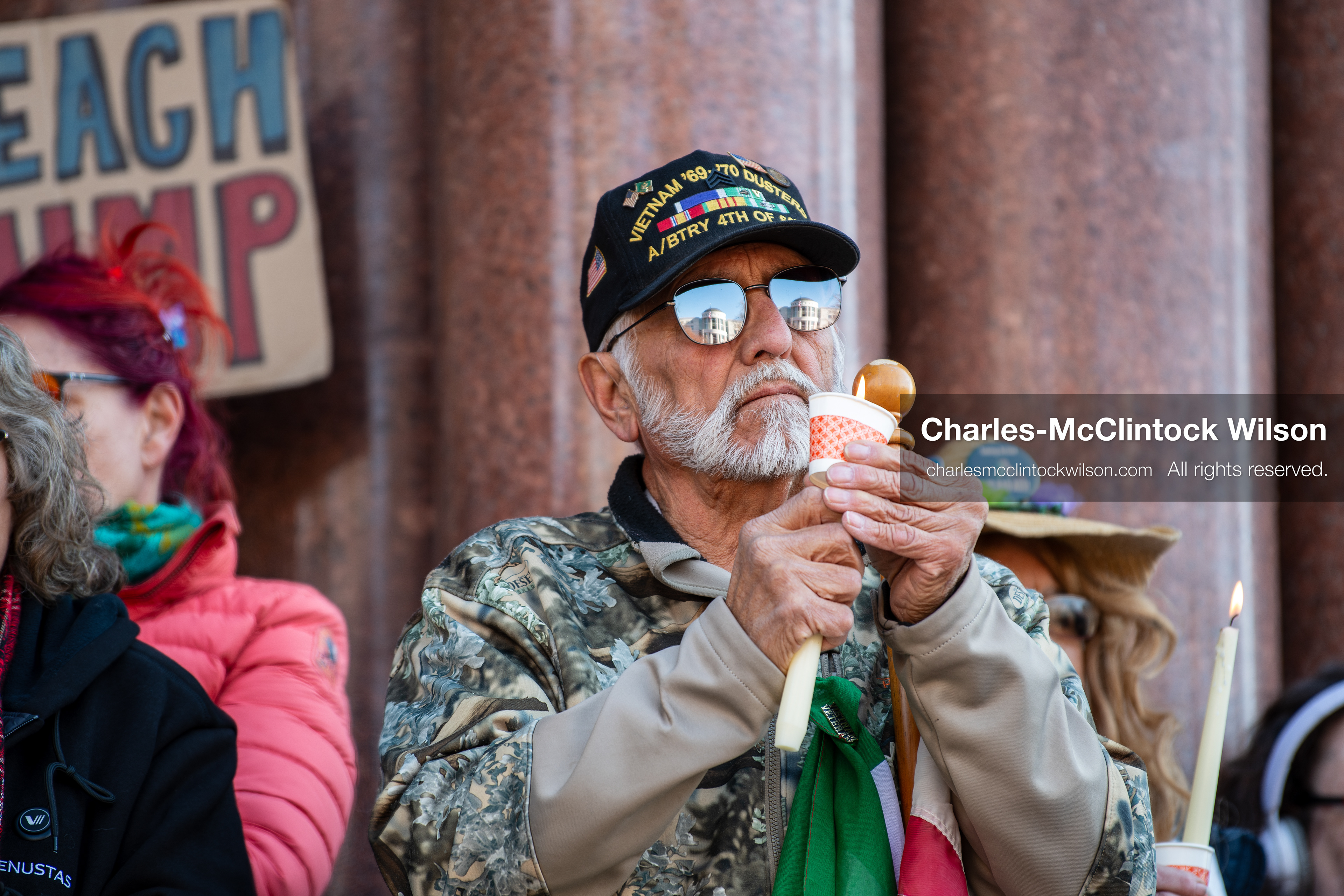 Salt Lake City, Utah, January 10, 2026: A man holds a candle during a vigil for Renee Nicole Good and other victims who died during ICE enforcement, part of the ICE Out for Good protest at Washington Square Park. (Credit Image: © Charles‑McClintock Wilson/ZUMA Press Wire)