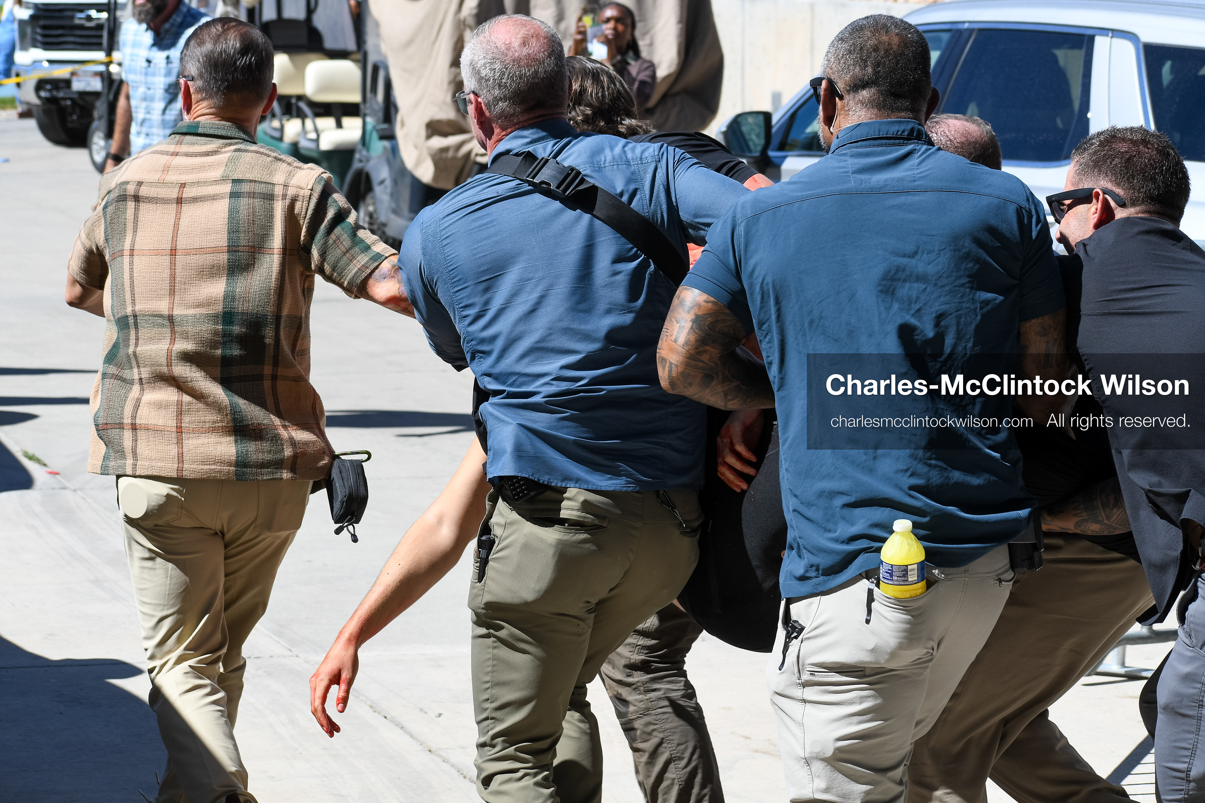 September 10, 2025, Orem, Utah, USA: American right-wing pundit Charlie Kirk, 31, the CEO and co-founder of the conservative youth organization Turning Point USA, hand dangles as he is being carried by security officers after he was shot Wednesday during an event at Utah Valley University. Kirk, a close ally of President Trump, was killed while speaking in front of a large crowd at Utah Valley University. (Credit Image: © Charles-McClintock Wilson/ZUMA Press Wire)