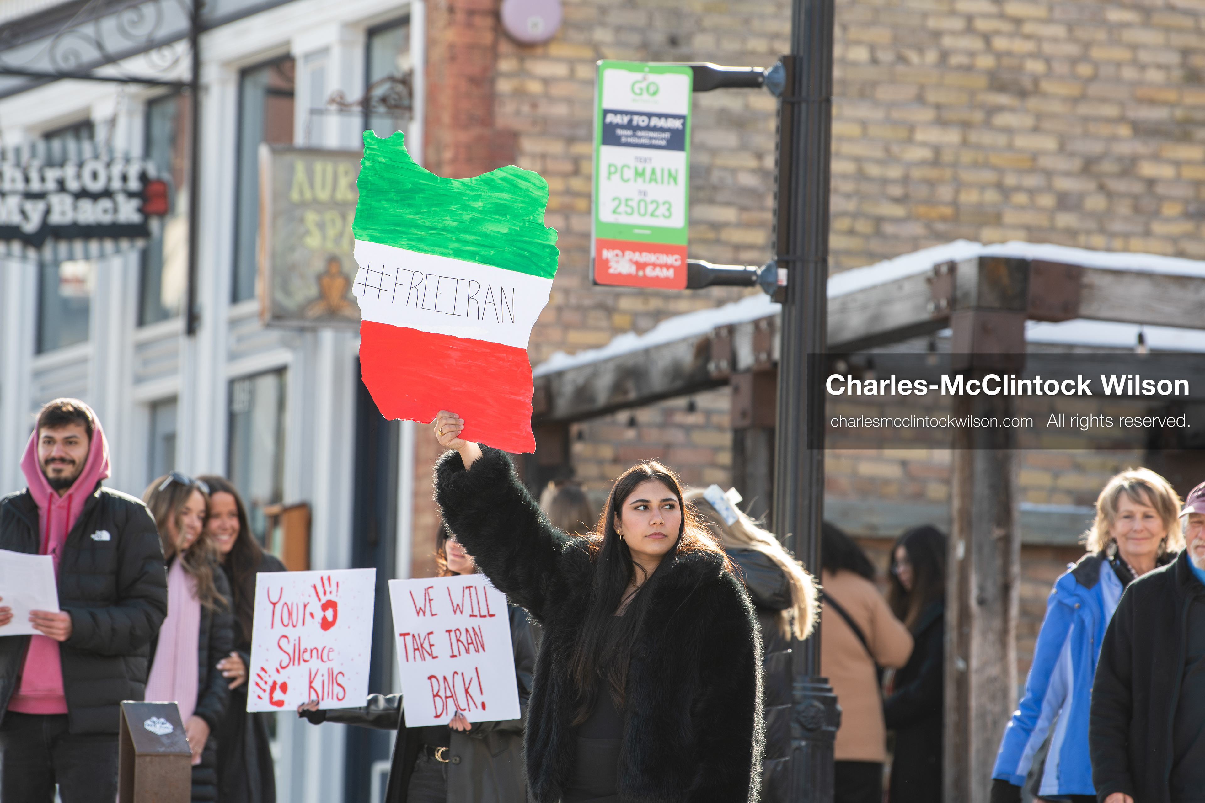 January 30, 2026, Park City, Utah, USA: Demonstrators hold signs during a small protest against the Iranian government on Main Street in Park City, Utah. (Credit Image: © Charles McClintock Wilson/ZUMA Press Wire)