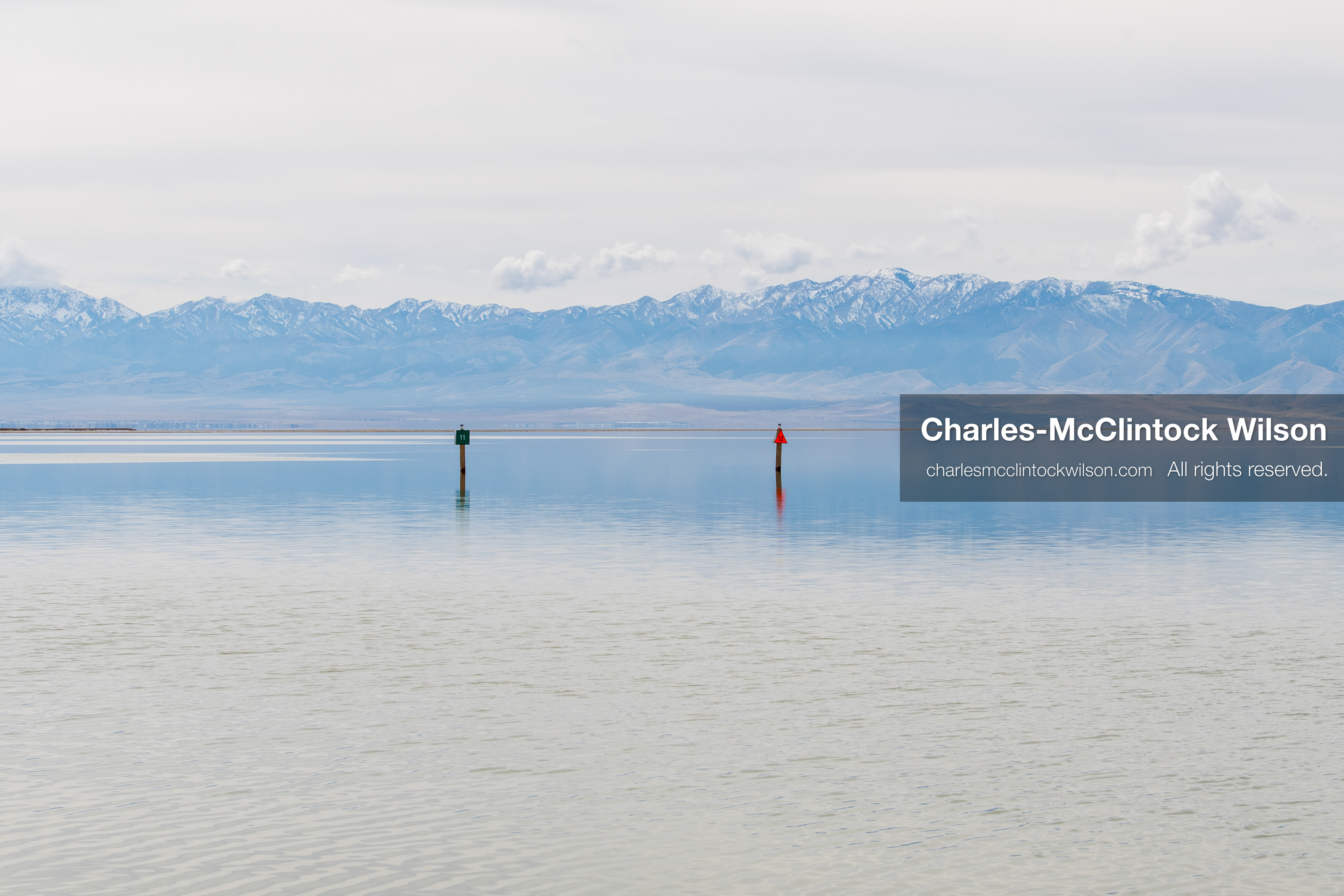 March 1, 2026, Great Salt Lake, Utah, USA: Navigation markers stand in calm water at the Great Salt Lake as the region continues to experience historically low water levels. Reports from state officials and the Great Salt Lake Strike Team state that the lake remains in a serious adverse‑effects range, with elevations among the lowest recorded in more than one hundred years. The lake has drawn increased public attention as lawmakers consider large‑scale water projects and long‑term plans to address declining conditions. (Credit Image: © Charles‑McClintock Wilson/ZUMA Press Wire)