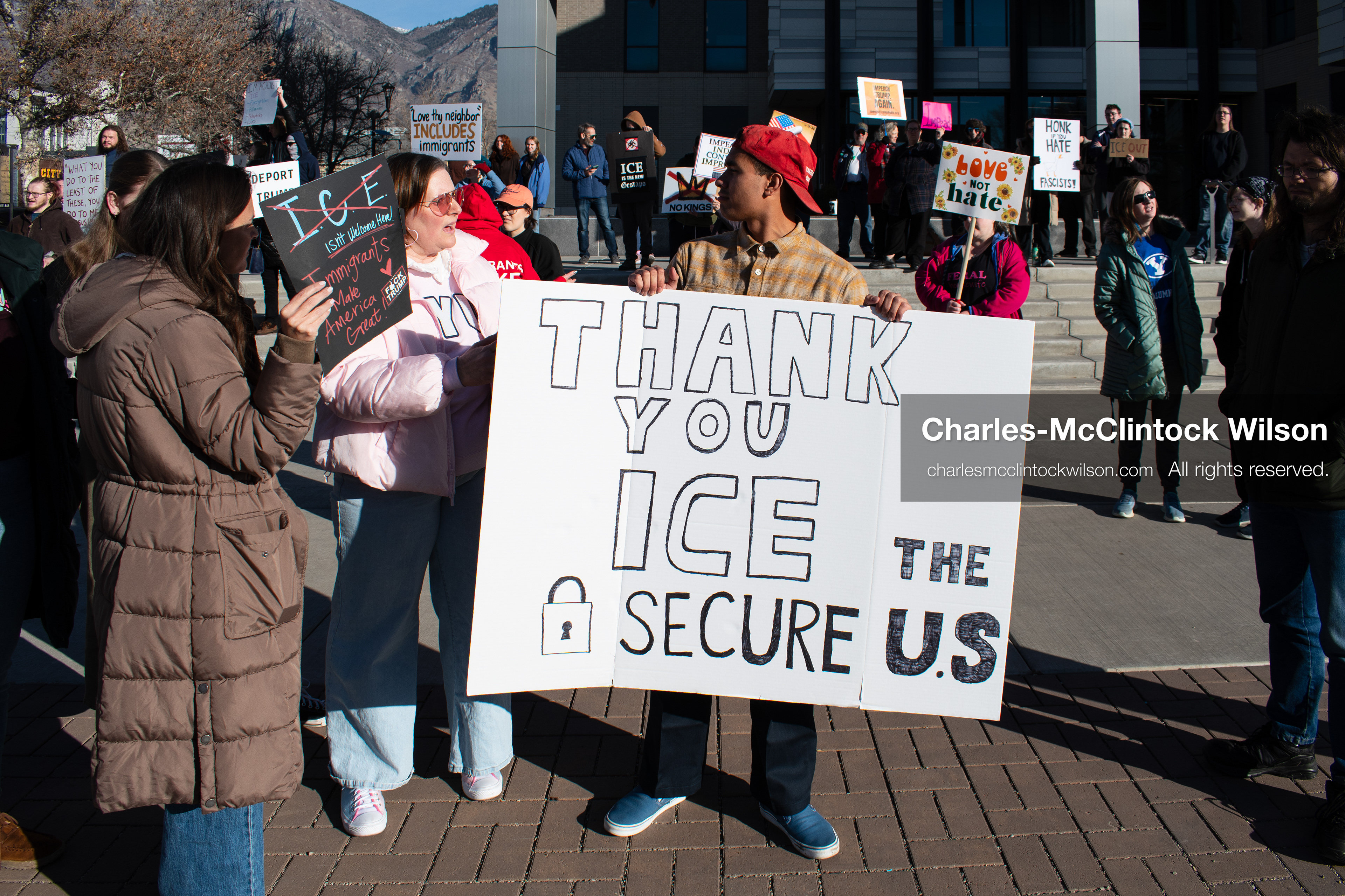  January 20, 2026, Provo, Utah, USA: A demonstrator holds a sign supporting ICE during the Free America Walkout outside Provo City Hall in Provo Utah on January 20 2026. The individual expressed support for US president Donald Trump and was confronted by other protesters. The nationwide protest drew participants with varied political views. (Credit Image: © Charles-McClintock Wilson/ZUMA Press Wire)