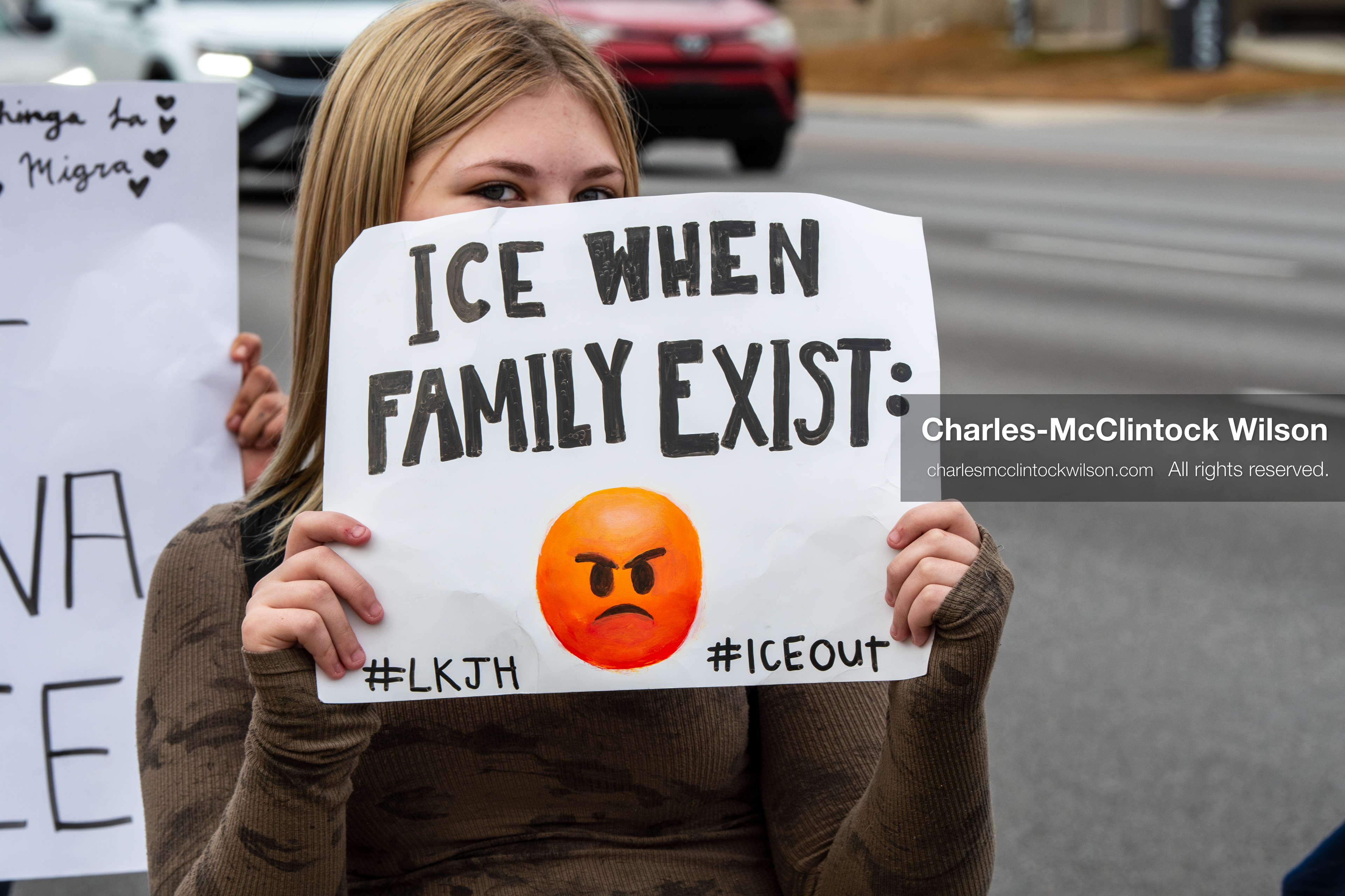 February 11, 2026, Orem, Utah, USA: A student stands along State Street during a student‑led protest involving participants from multiple Orem schools. (Credit Image: © Charles‑McClintock Wilson/ZUMA Press Wire)