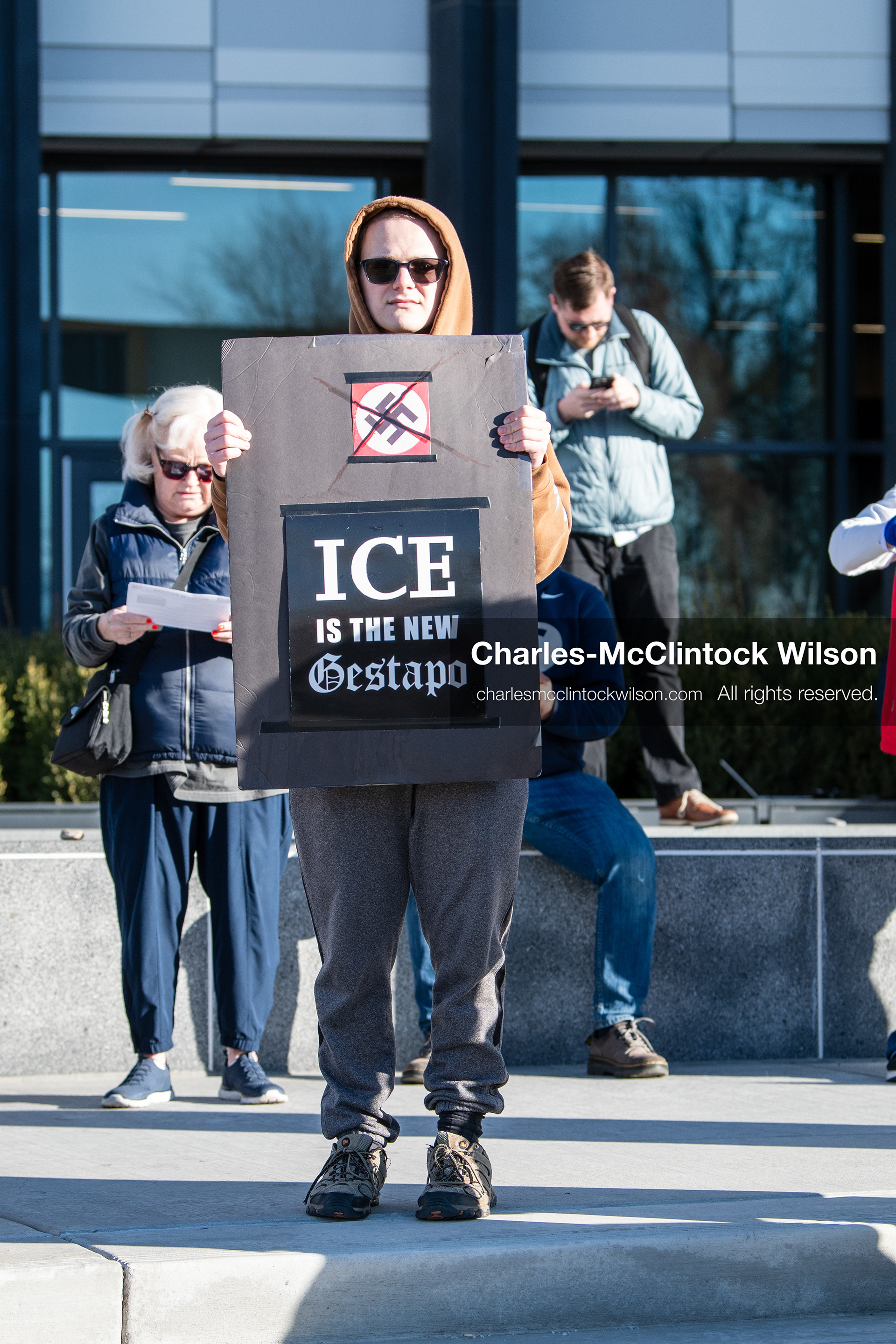 January 20, 2026, Provo, Utah, USA: A demonstrator stands outside Provo City Hall during the Free America Walkout protest in Provo Utah on January 20 2026. The nationwide event called for immigration reform and changes to detention practices. 