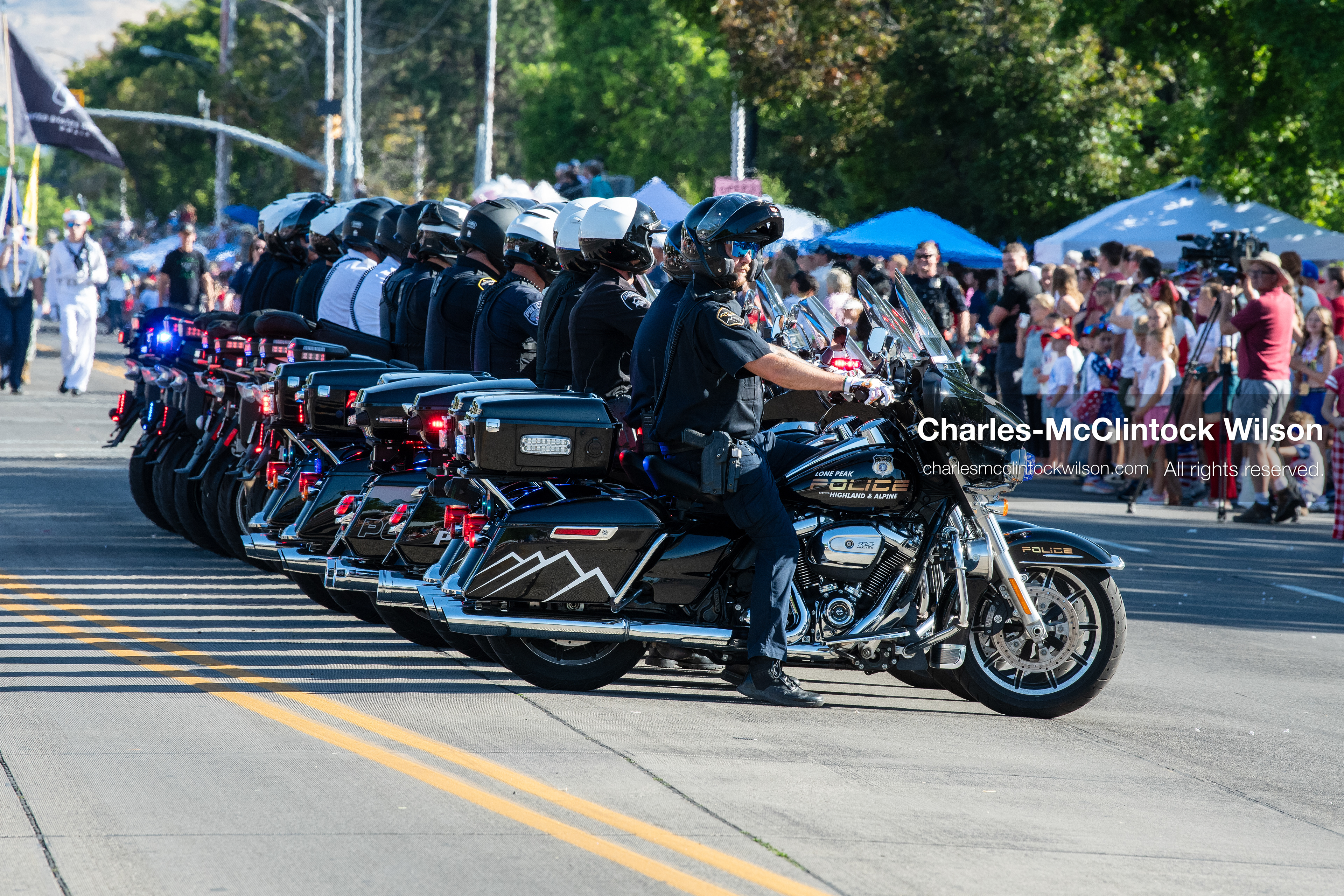 July 4, 2026, Provo, Utah, USA: Police motor officers line up their motorcycles with flashing emergency lights during America's Freedom Festival Grand Parade in Provo, Utah, Saturday, July 4, 2026. The annual Independence Day event features expanded programming to honor the 250th anniversary of United States independence. (Credit Image: © Charles-McClintock Wilson/ZUMA Press Wire)