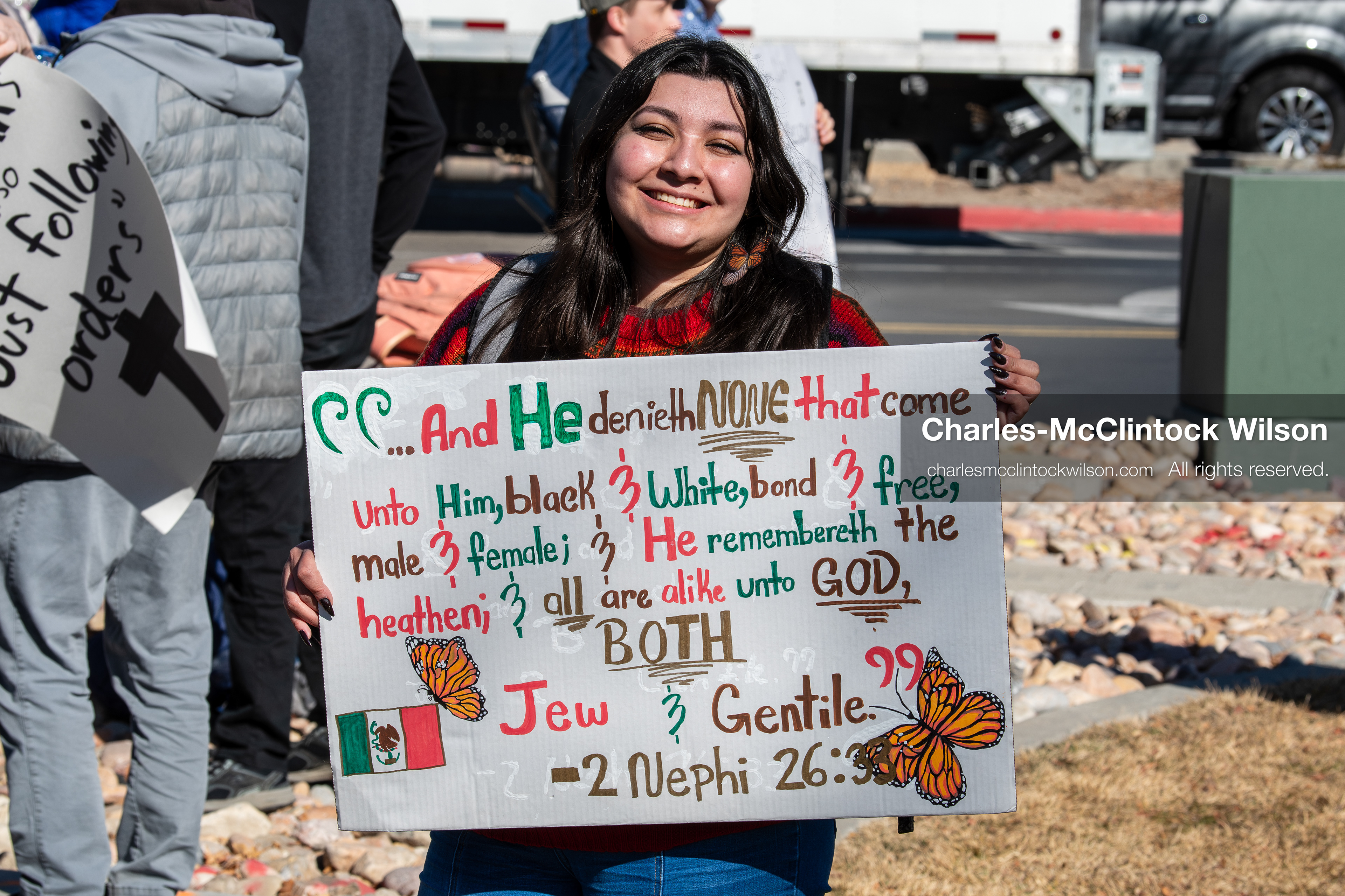 February 5, 2026, Provo, Utah, USA: A demonstrator holds a sign during a gathering near Brigham Young University in Provo where students and community members protested the presence of US Customs and Border Protection recruiters at a career fair held on the BYU campus. (Credit Image: © Charles McClintock Wilson/ZUMA Press Wire)