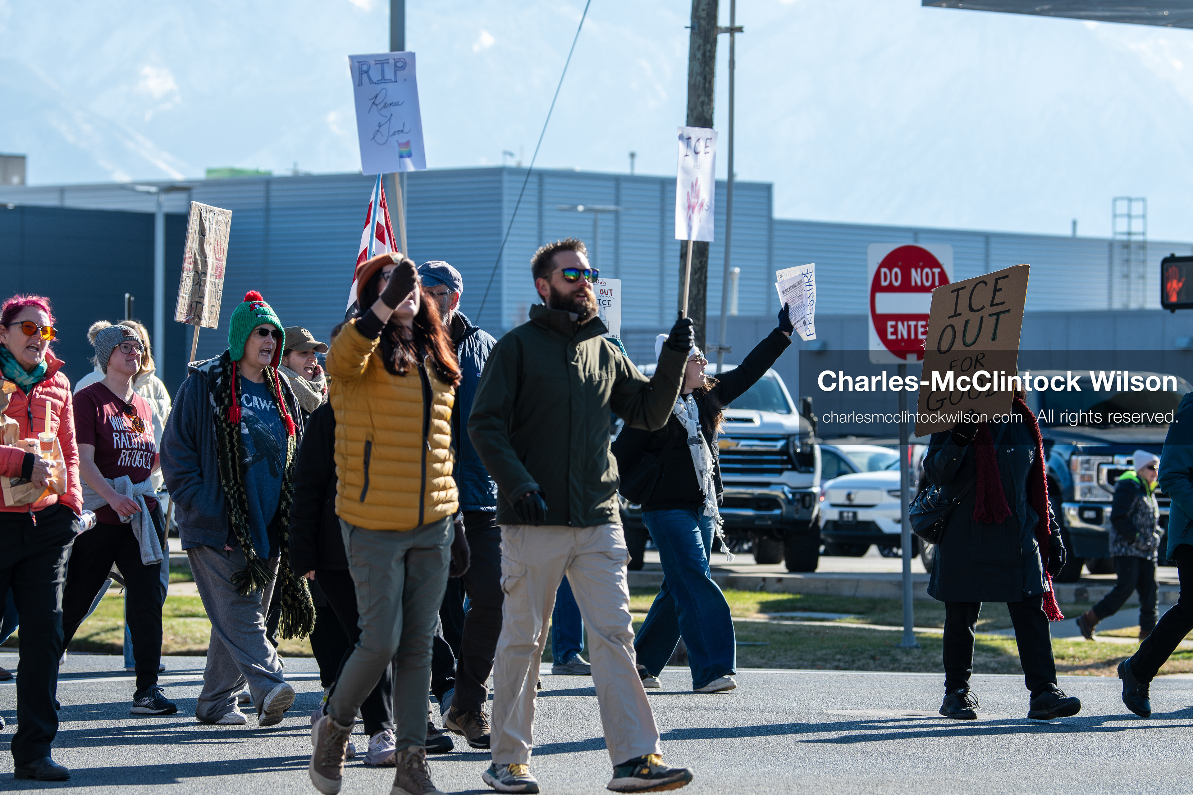 Salt Lake City, Utah, January 10, 2026: A group of demonstrators marches through downtown Salt Lake City during the ICE Out for Good protest, which began at Washington Square Park, with participants carrying signs and personal items as they walk together. (Credit Image: © Charles‑McClintock Wilson/ZUMA Press Wire)