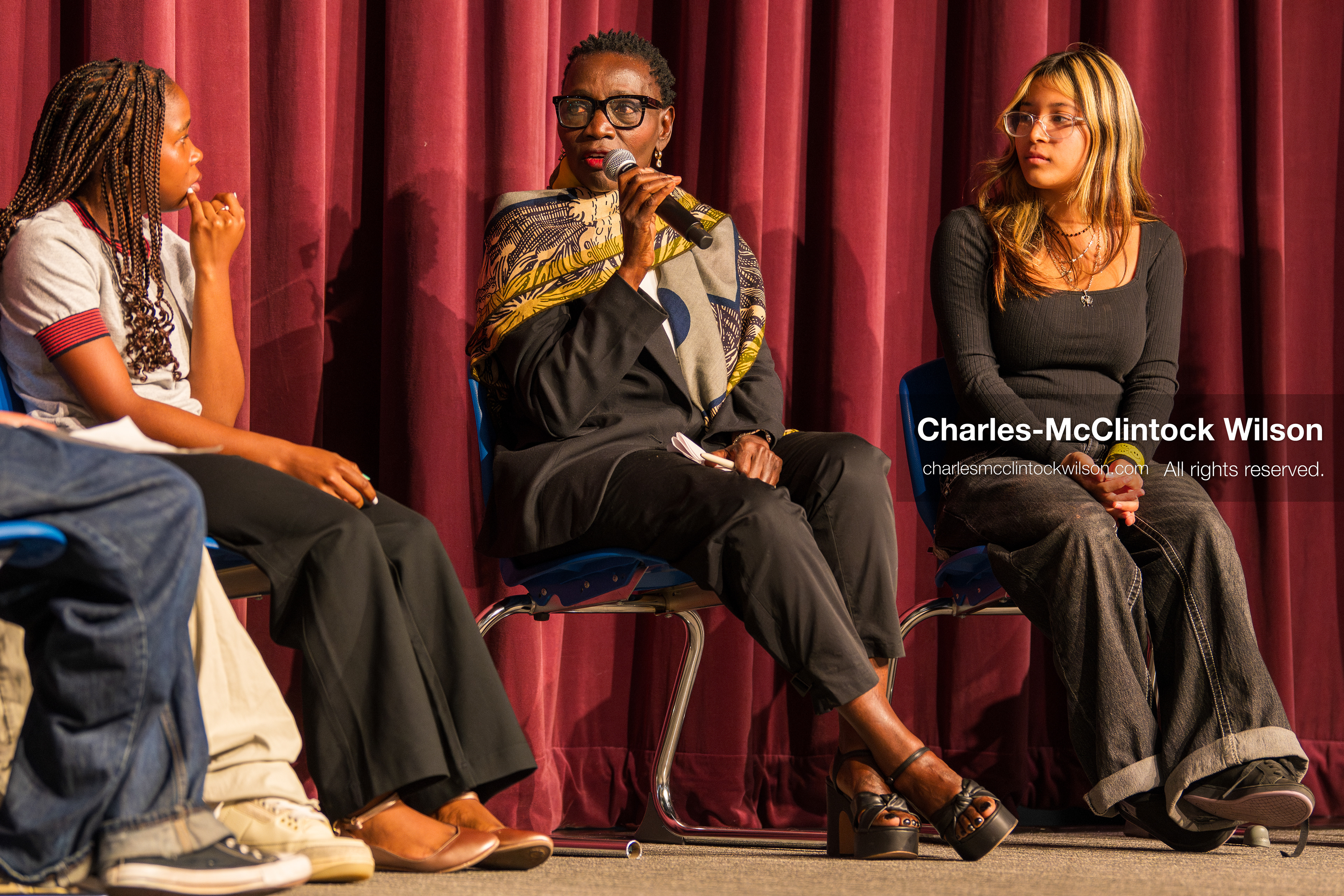 June 24, 2026, Salt Lake City, Utah, USA: Dr. AUMA OBAMA, founder of the Sauti Kuu Foundation and sister of former US president Barack Obama, speaks into a microphone alongside students during the ''You(th) Matter'' community event at Glendale Middle School in Salt Lake City, Utah. (Credit Image: © Charles-McClintock Wilson/ZUMA Press Wire)