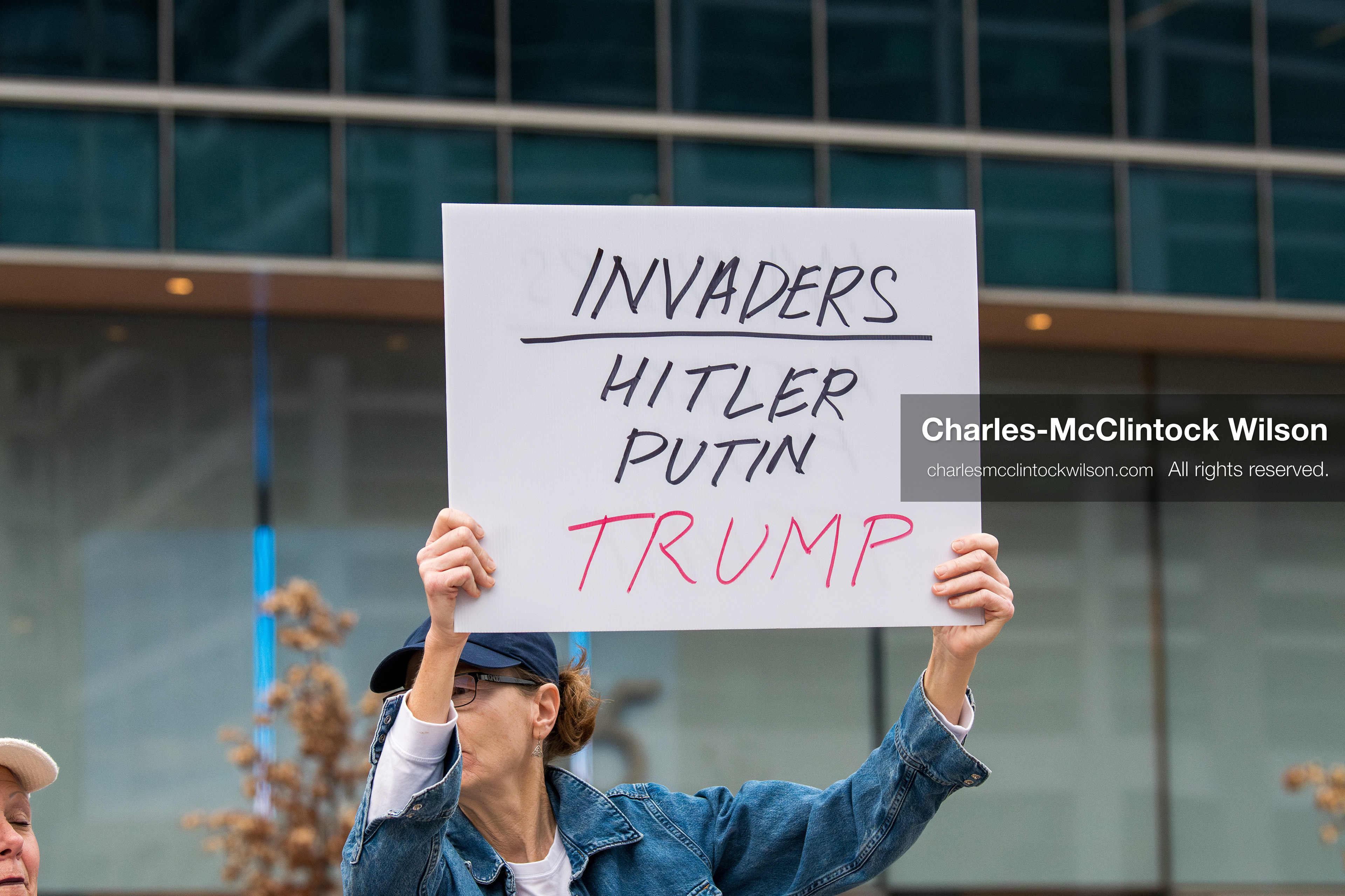 January 3, 2026, Salt Lake City, Utah, USA: A protester holds a sign during a demonstration against US action in Venezuela outside the Wallace Federal Building in Salt Lake City, Utah. The protest was part of a nationwide mobilization responding to recent military developments. (Credit Image: (c) Charles‑McClintock Wilson/ZUMA Press Wire)
