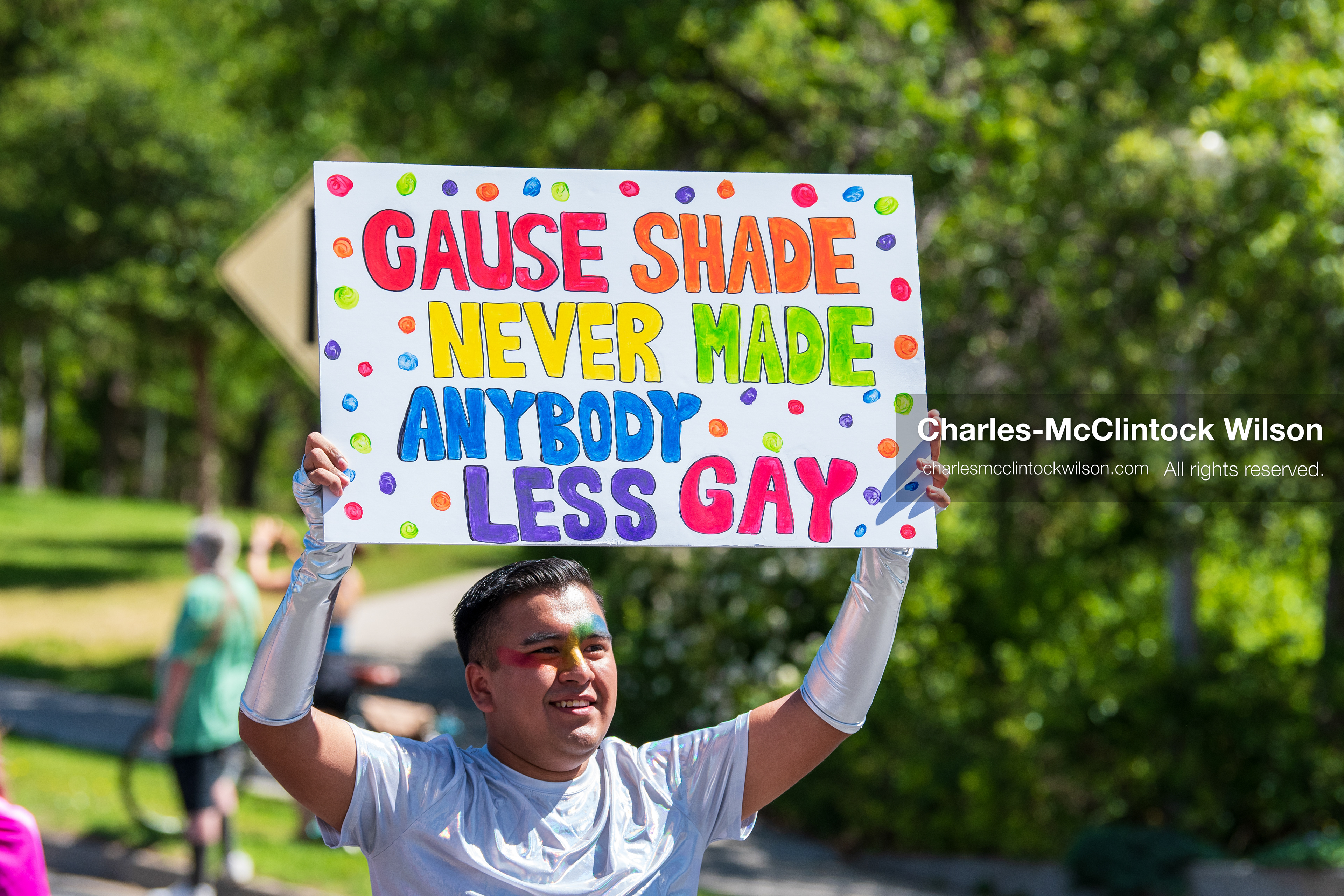 June 6, 2026, Salt Lake City, Utah, USA: A participant holds up a sign reading ''Cause Shade Never Made Anybody Less Gay'' during the Utah Pride Rally and March. (Credit Image: © Charles-McClintock Wilson/ZUMA Press Wire)