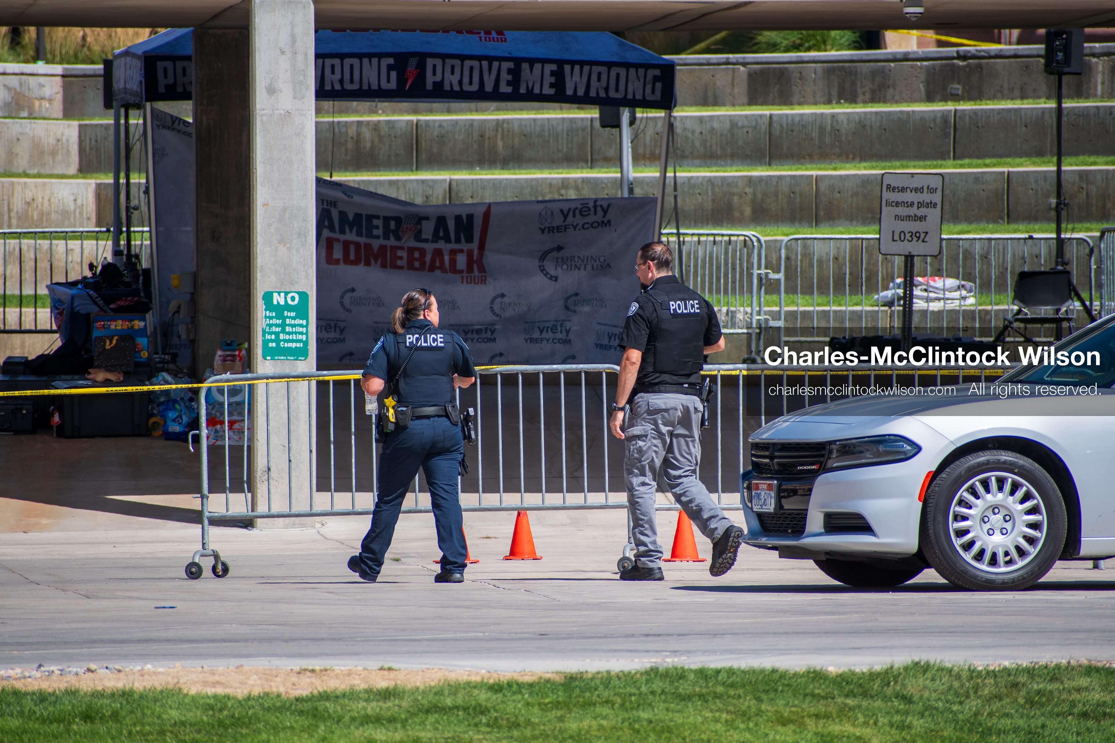 September 12, 2025, Orem, Utah, USA: Investigators and police officers secure the canopy-covered courtyard at Utah Valley University in Orem, Utah, where conservative activist CHARLIE KIRK was fatally shot during a public speaking event on September 10, 2025. KIRK, CEO of Turning Point USA, was seated beneath the canopy when a single bullet struck him in the neck.   (Credit Image: © Charles‑McClintock Wilson/ZUMA Press Wire)