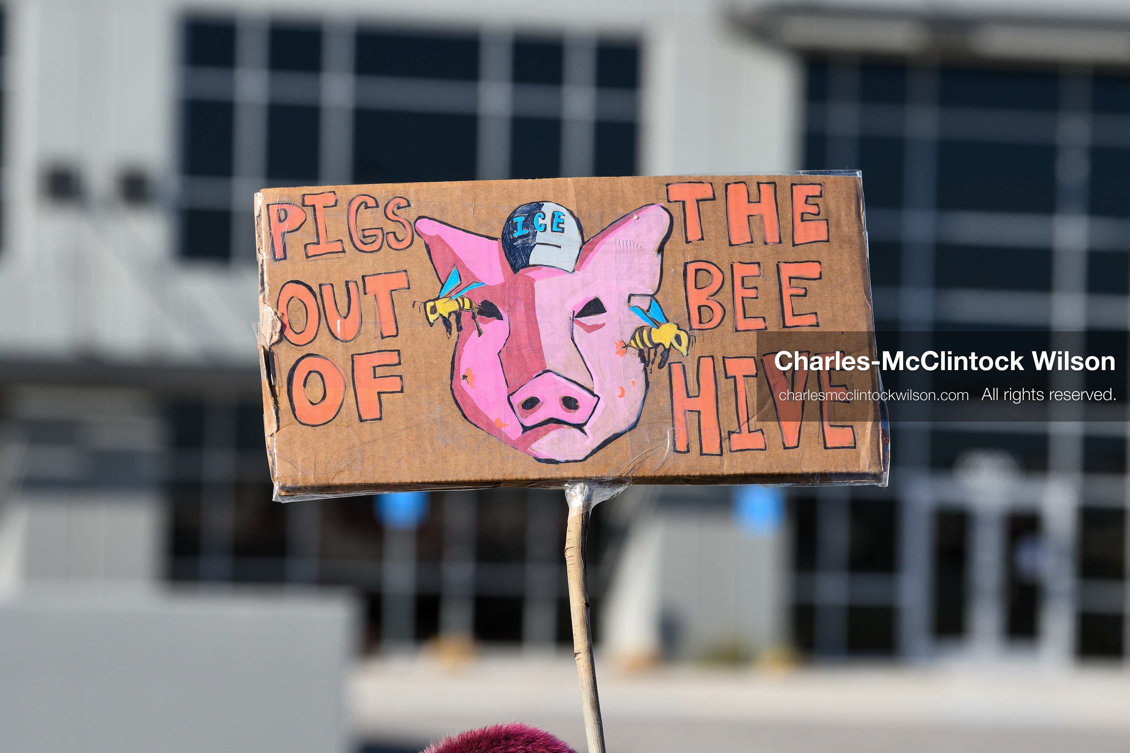March 18, 2026, Salt Lake City, Utah, USA: A protester holds a sign during a demonstration at the site of a proposed ICE detention facility on the west side of Salt Lake City. Demonstrators gathered near the warehouse property as part of an ongoing community response to the planned facility. (Credit Image: © Charles McClintock Wilson/ZUMA Press Wire)