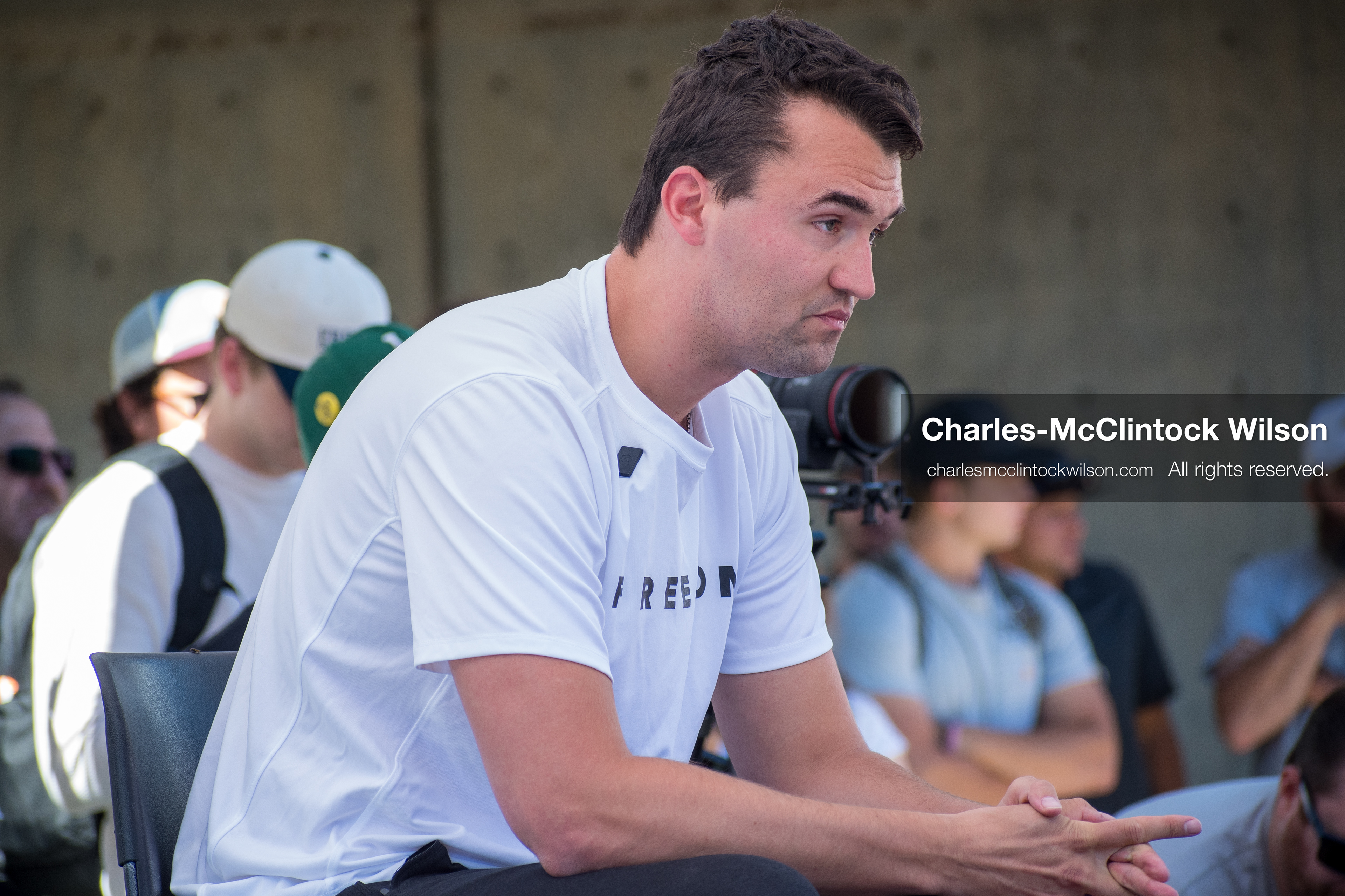 OREM, UTAH – SEPTEMBER 10, 2025: Charlie Kirk appears focused and resolute during a public event at Utah Valley University. Captured in a moment of quiet intensity, Kirk looks off-camera as media lenses track his movements. The image reflects the tension and conviction that defined his final public appearance before the shooting incident that disrupted the event. © Charles-McClintock Wilson / ZUMA Press 