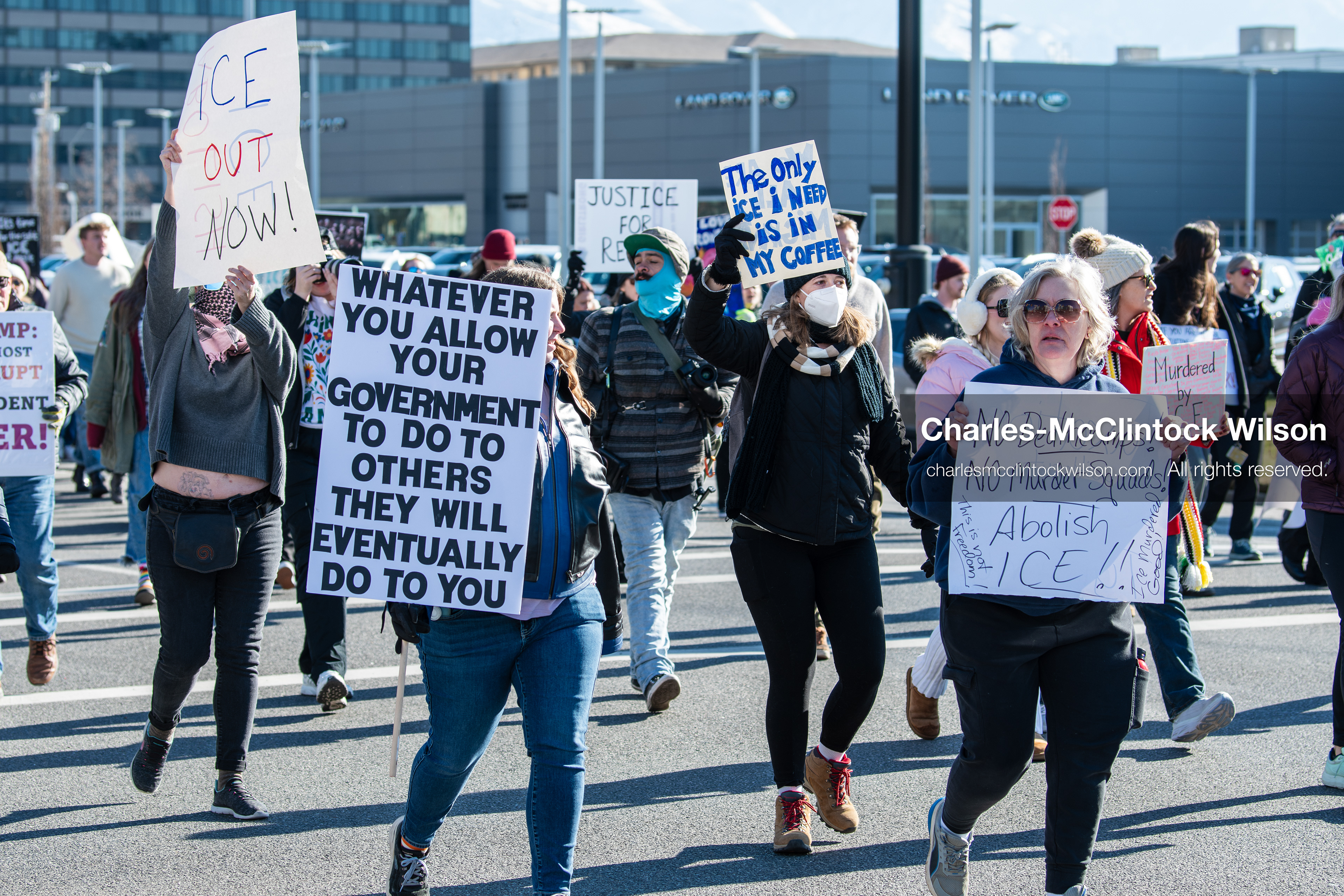 Salt Lake City, Utah, January 10, 2026: A group of demonstrators marches through downtown Salt Lake City during the ICE Out for Good protest, which began at Washington Square Park, with participants carrying signs and personal items as they walk together. (Credit Image: © Charles‑McClintock Wilson/ZUMA Press Wire)