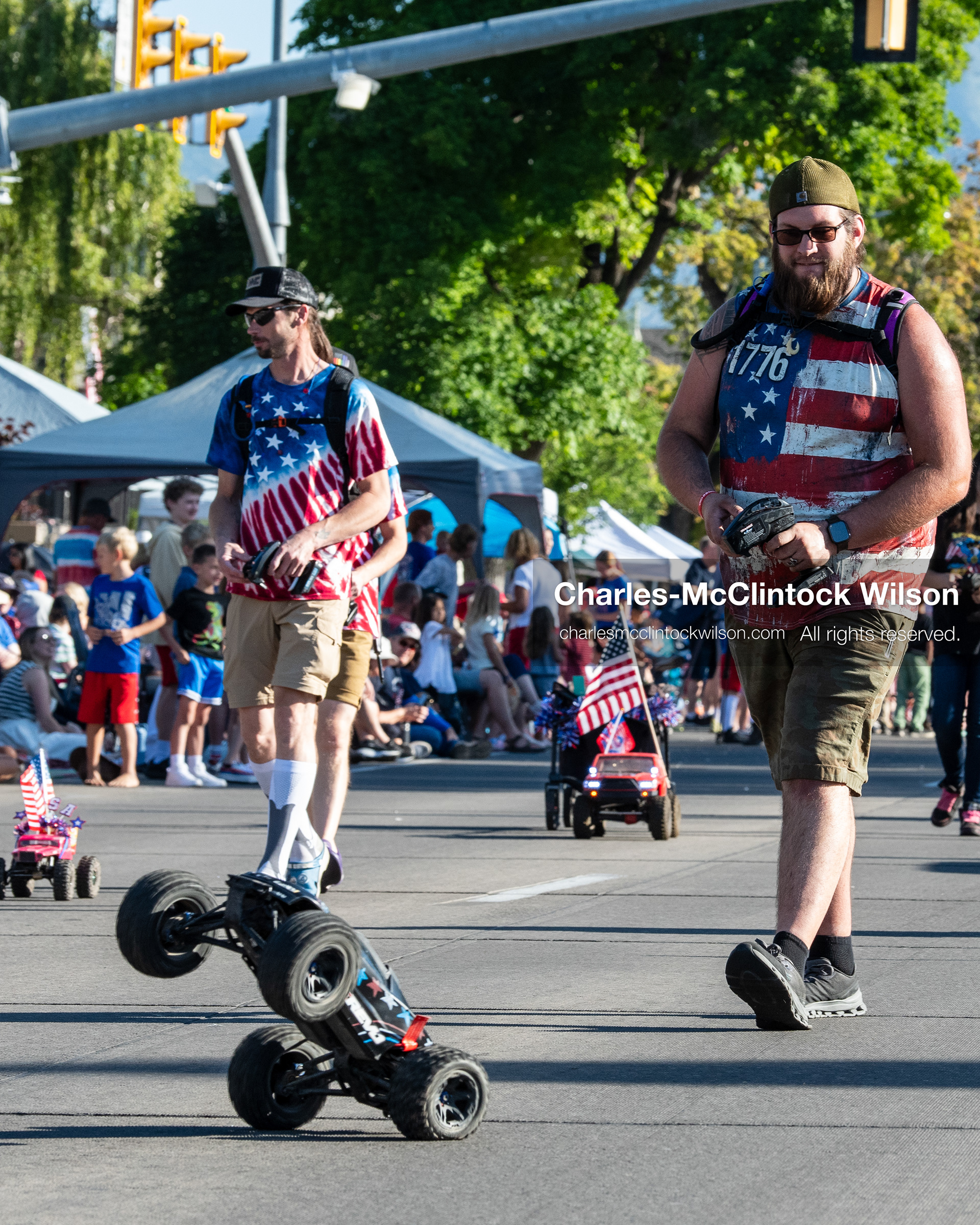 July 4, 2026, Provo, Utah, USA: Remote-controlled car enthusiasts operate RC monster trucks along the route during America's Freedom Festival Grand Parade in Provo, Utah, Saturday, July 4, 2026. The annual Independence Day event features expanded programming to honor the 250th anniversary of United States independence. (Credit Image: © Charles-McClintock Wilson/ZUMA Press Wire)
