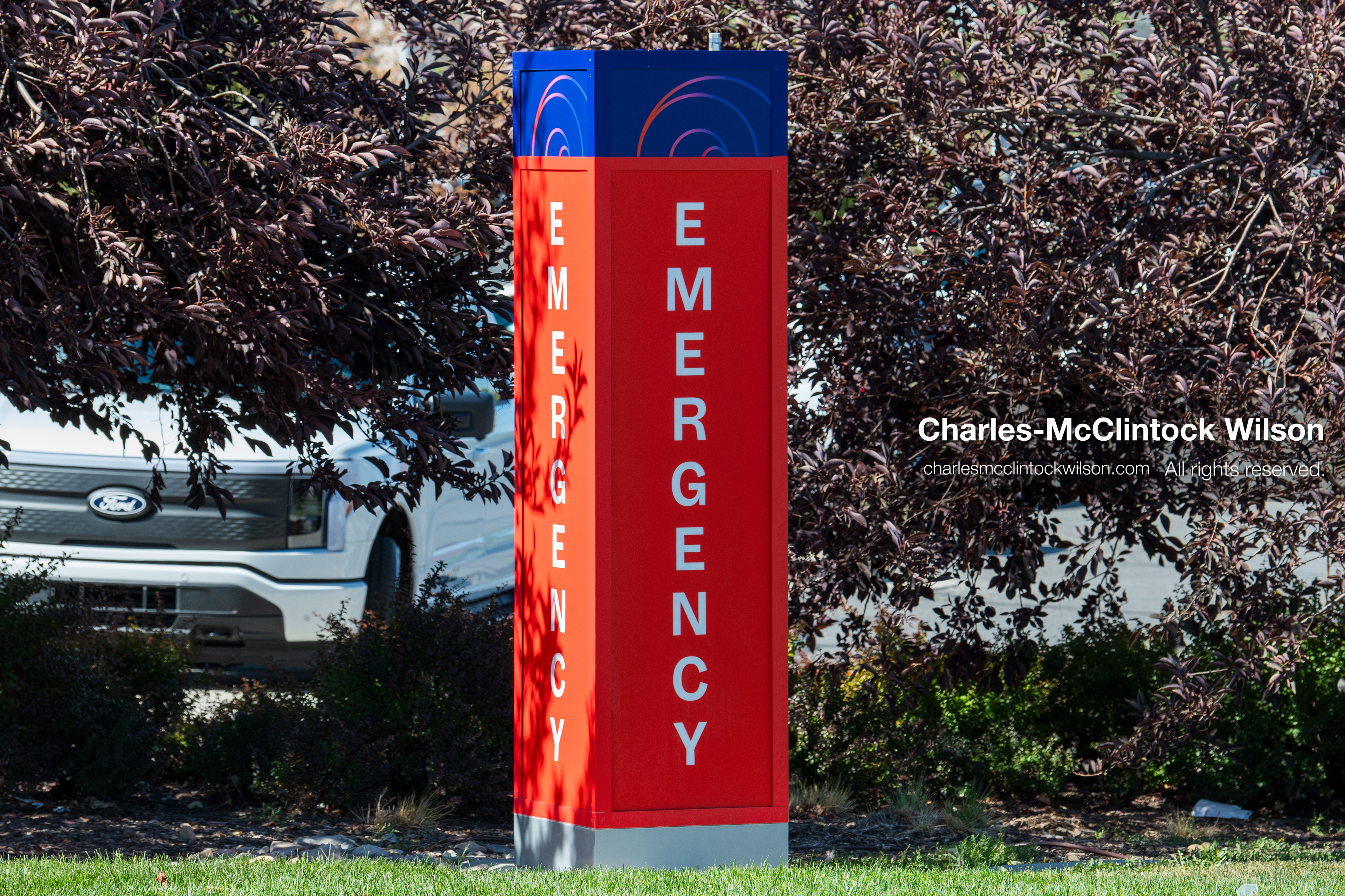 An exterior directional pillar sign marks the emergency department entrance outside Intermountain Medical Center in Murray, Utah, on Monday, August 17, 2026. Multiple regional law enforcement agencies converged to heavily secure the hospital perimeter as a safety precaution after shooting victims arrived from a fatal shootout that erupted outside a funeral service in nearby Kearns earlier that day. (Photo by Charles-McClintock Wilson/Sipa USA)
