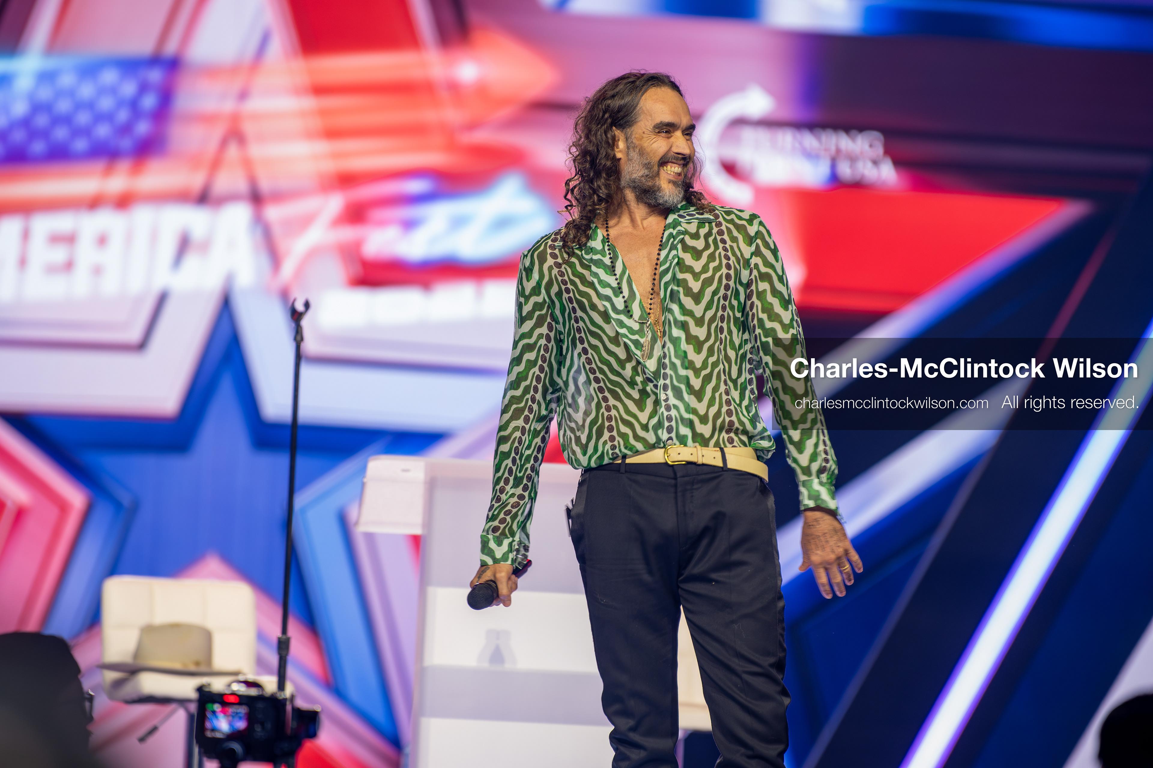 December 18, 2025, Phoenix, Arizona, USA: Russell Brand speaks during Day One of Turning Point USA’s AmericaFest 2025 at the Phoenix Convention Center in Phoenix, Arizona.   (Credit Image: © Charles‑McClintock Wilson/ZUMA Press Wire)