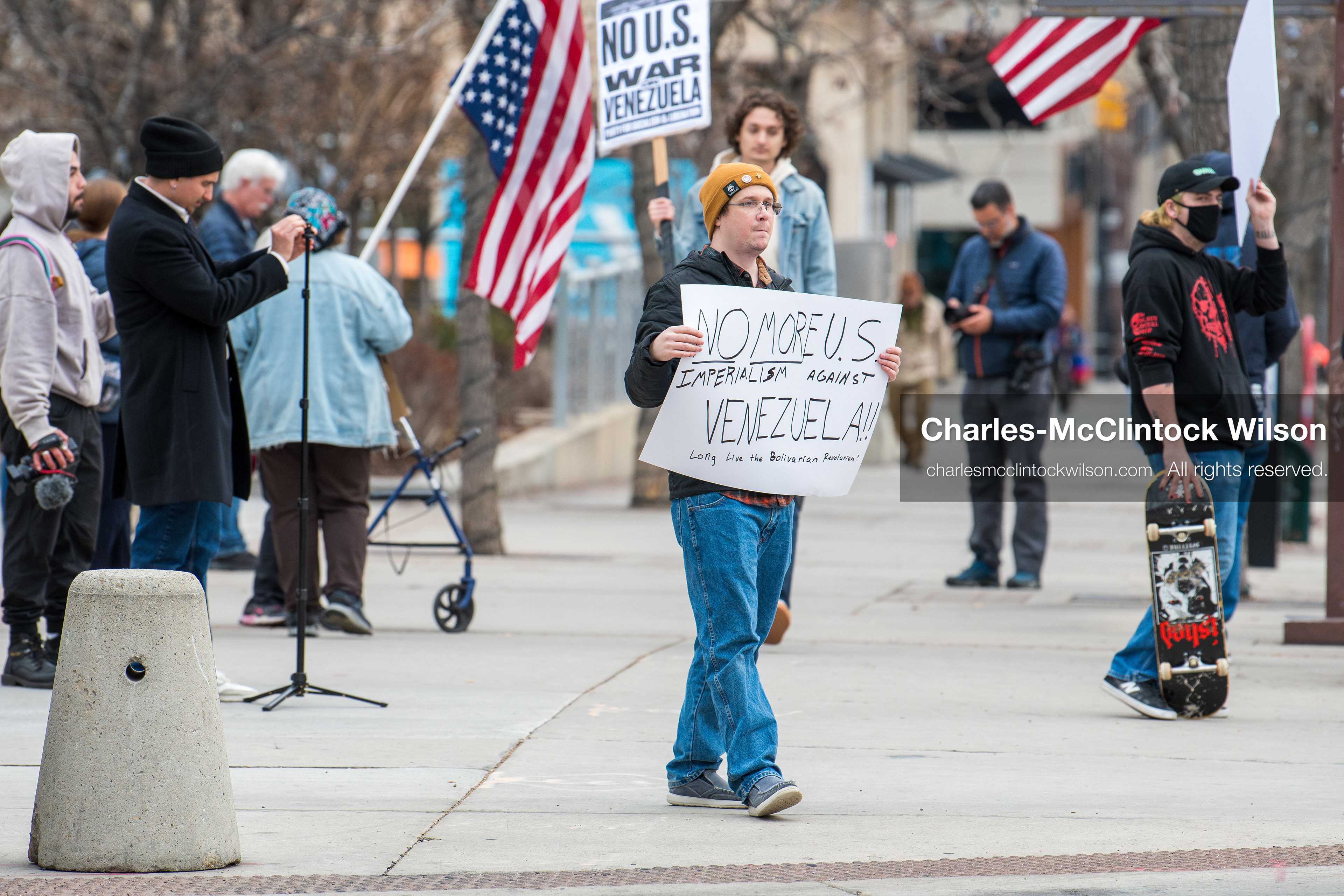 January 3, 2026, Salt Lake City, Utah, USA: A protester holds a sign during a demonstration against US action in Venezuela outside the Wallace Federal Building in Salt Lake City, Utah. The protest was part of a nationwide mobilization responding to recent military developments. (Credit Image: (c) Charles‑McClintock Wilson/ZUMA Press Wire)