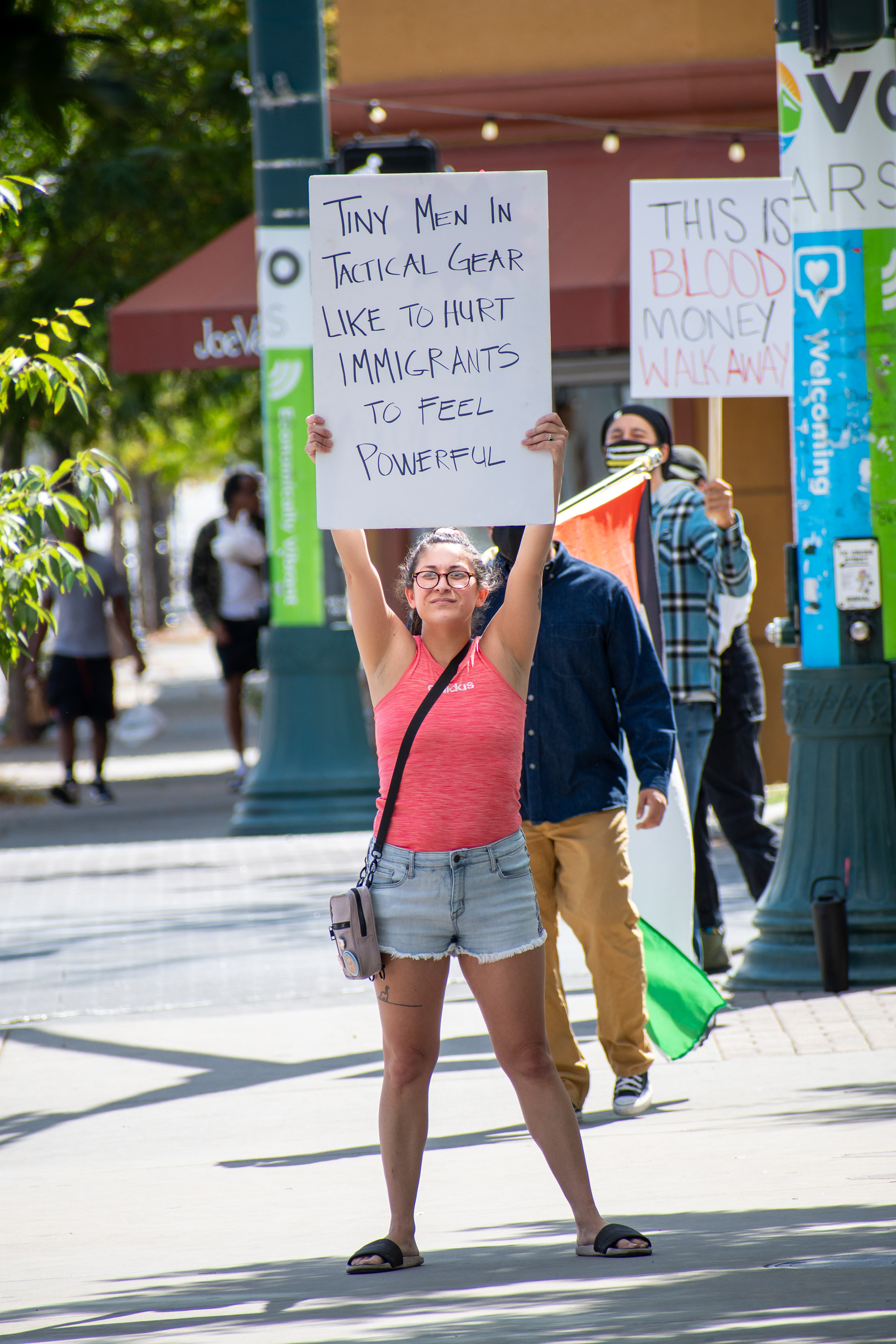 September 15, 2025 – Provo, Utah, United States: Demonstrators hold signs outside the Utah Valley Convention Center during a protest against the Department of Homeland Security career expo, voicing opposition to federal policing and immigration enforcement. Photograph by Charles‑McClintock Wilson / ZUMA Press Wire