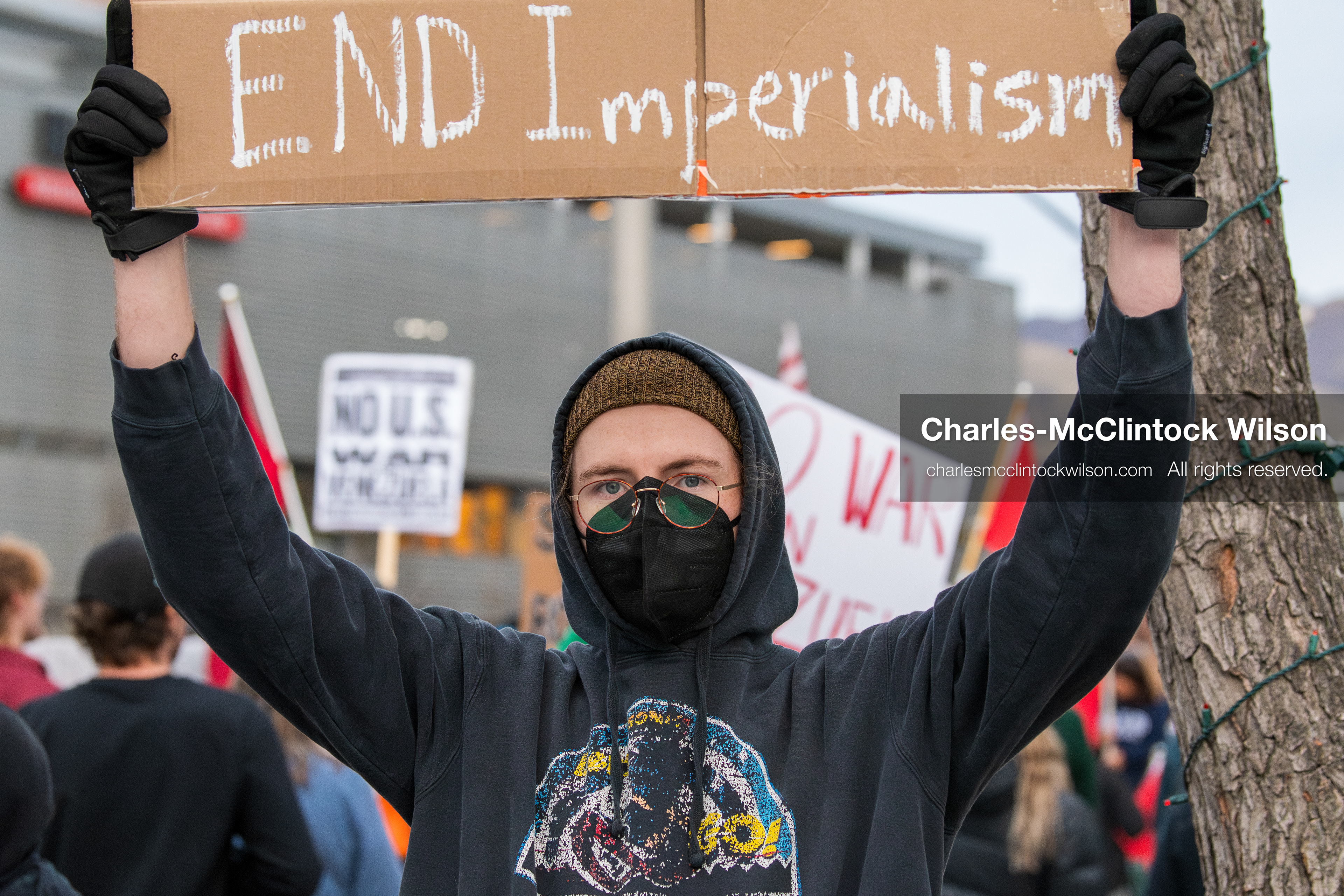 January 3, 2026, Salt Lake City, Utah, USA: A protester holds a sign during a demonstration against US action in Venezuela outside the Wallace Federal Building in Salt Lake City, Utah. The protest was part of a nationwide mobilization responding to recent military developments. (Credit Image: (c) Charles‑McClintock Wilson/ZUMA Press Wire)