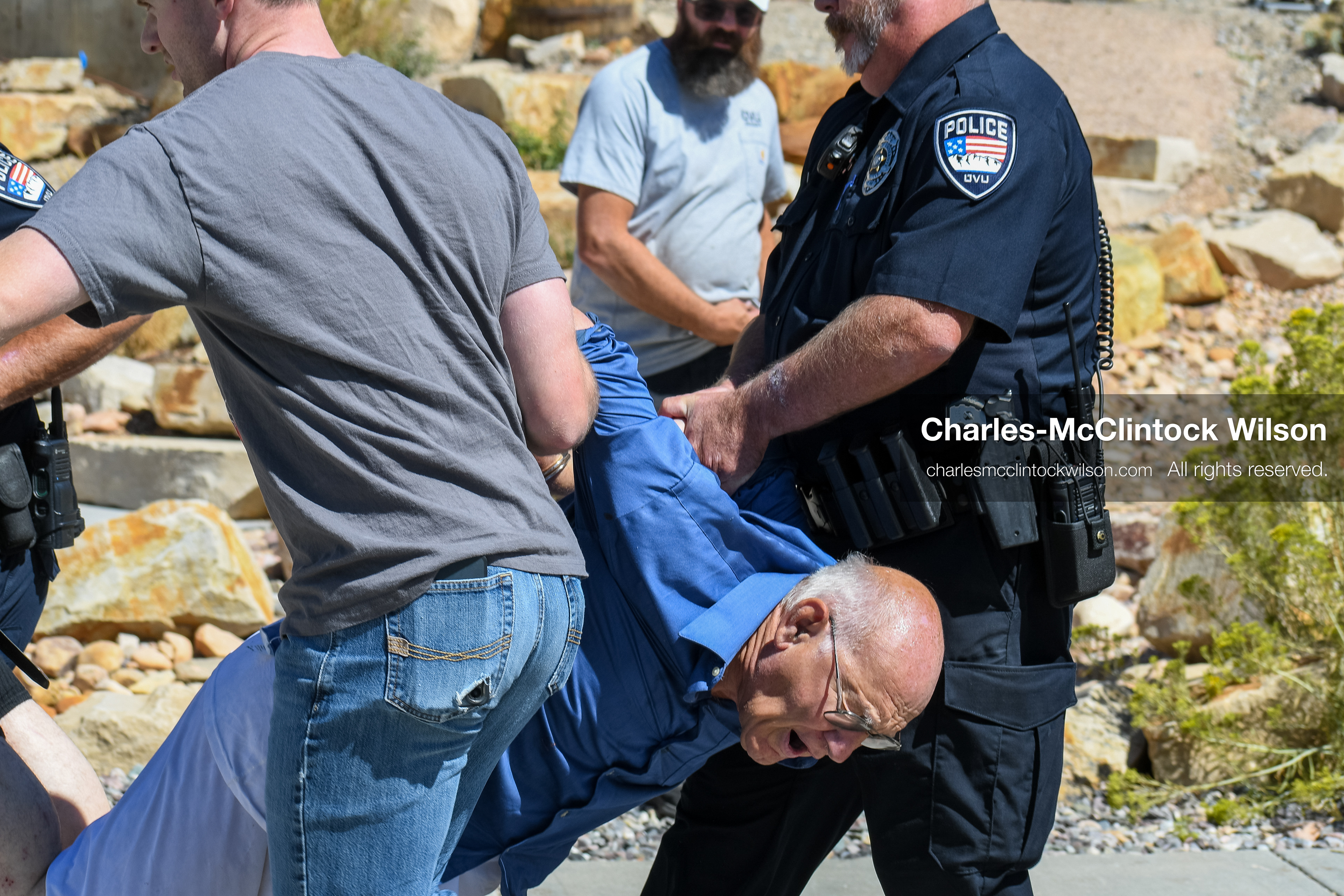September 10, 2025, Orem, Utah, USA: George Zinn is taken into custody by campus security following the fatal shooting of Charlie Kirk during a public event at Utah Valley University. At the time of the arrest, Zinn was identified as the alleged shooter. He was later released and subsequently arrested on unrelated charges. Law enforcement confirmed that the actual suspect remained at large during this initial response. (Credit Image: © Charles-McClintock Wilson/ZUMA Press Wire)