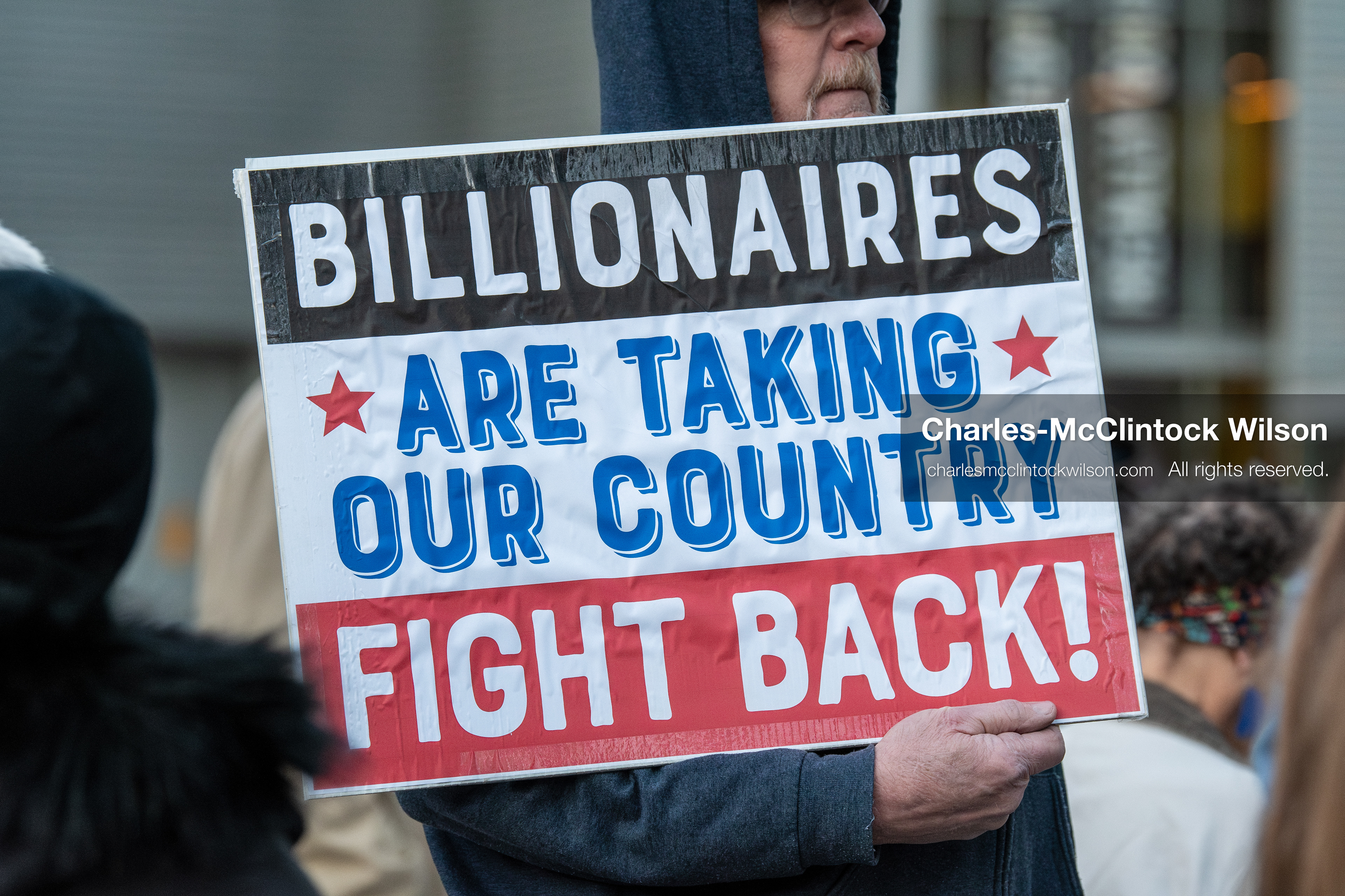 January 5, 2026, Salt Lake City, Utah, USA: A demonstrator holds a sign during a protest outside the Wallace Federal Building in Salt Lake City, Utah. The rally, organized by Salt Lake Indivisible, called for congressional limits on presidential war powers following recent US military actions in Venezuela involving the government of Nicolas Maduro. (Credit Image: (c) Charles‑McClintock Wilson/ZUMA Press Wire)