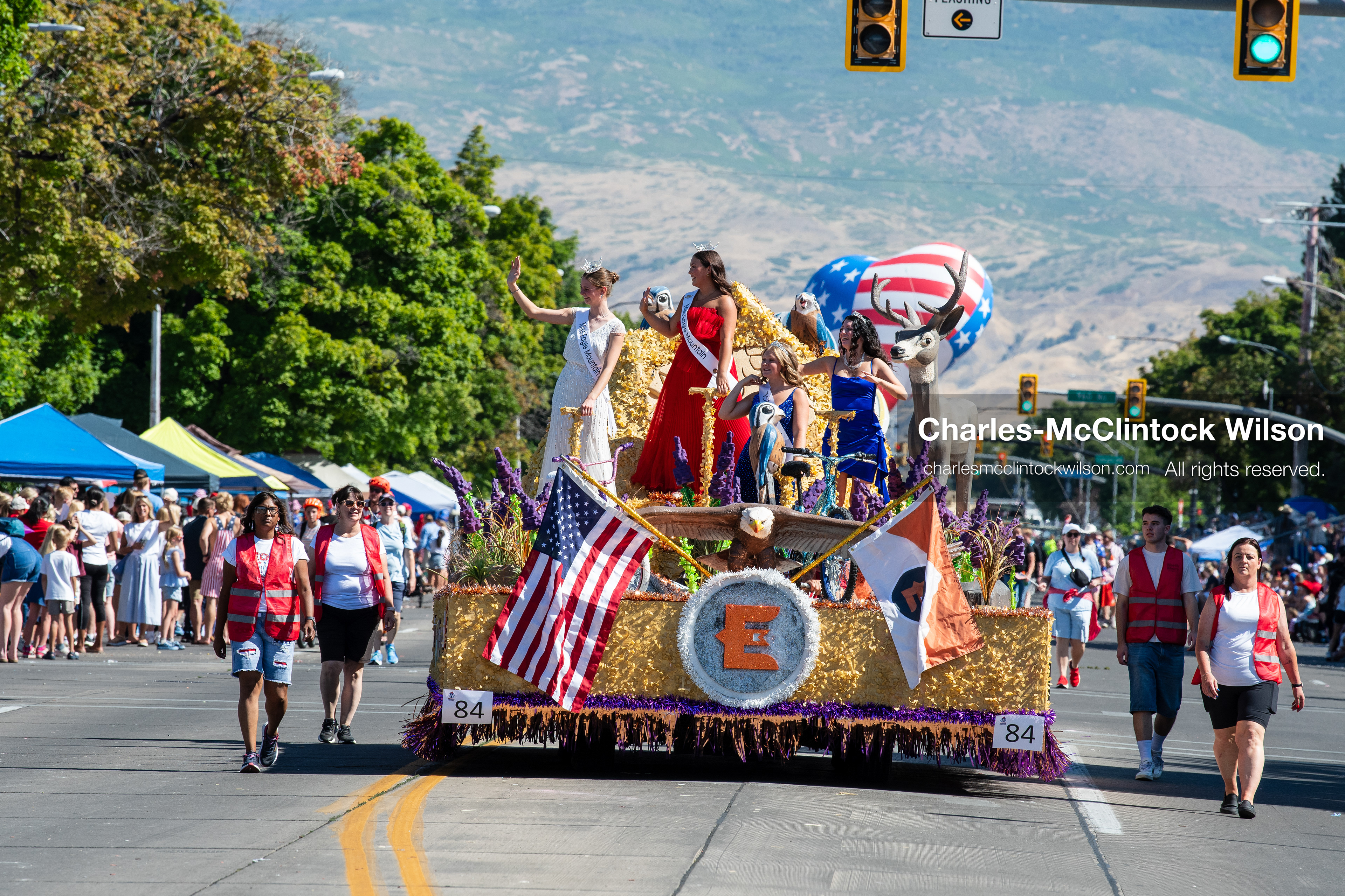 July 4, 2026, Provo, Utah, USA: A brightly colored community float carrying youth performers rolls down the street during America's Freedom Festival Grand Parade in Provo, Utah, Saturday, July 4, 2026. The annual event drew thousands of spectators to the downtown corridor. (Credit Image: © Charles-McClintock Wilson/ZUMA Press Wire)