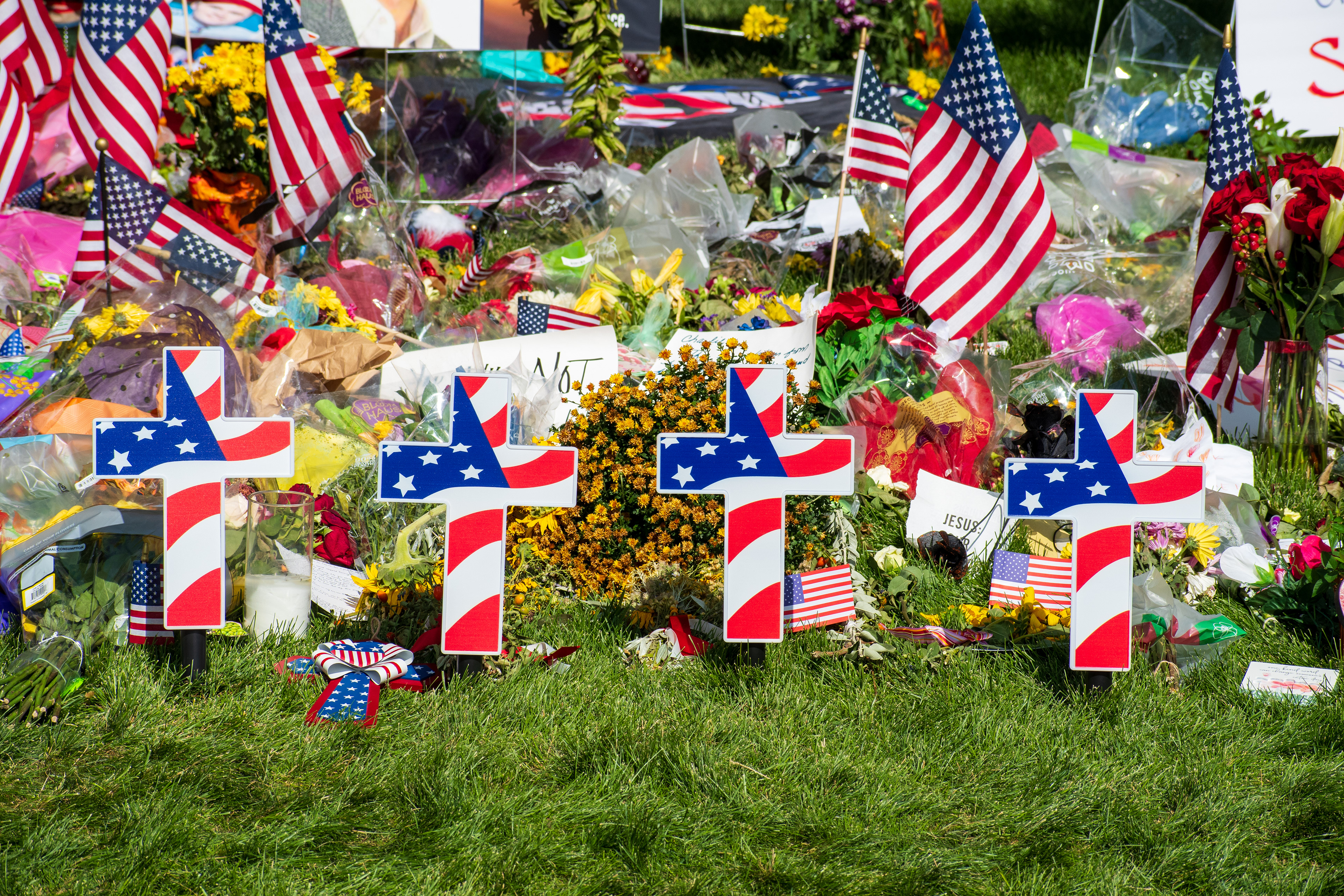OREM, UTAH – SEPTEMBER 15, 2025: A memorial honoring Charlie Kirk is seen on the campus of Utah Valley University, featuring American flags, candles, flowers, and handwritten signs arranged around a large portrait. The tribute appeared days after Kirk’s final public event at the university. © Charles‑McClintock Wilson / ZUMA Press