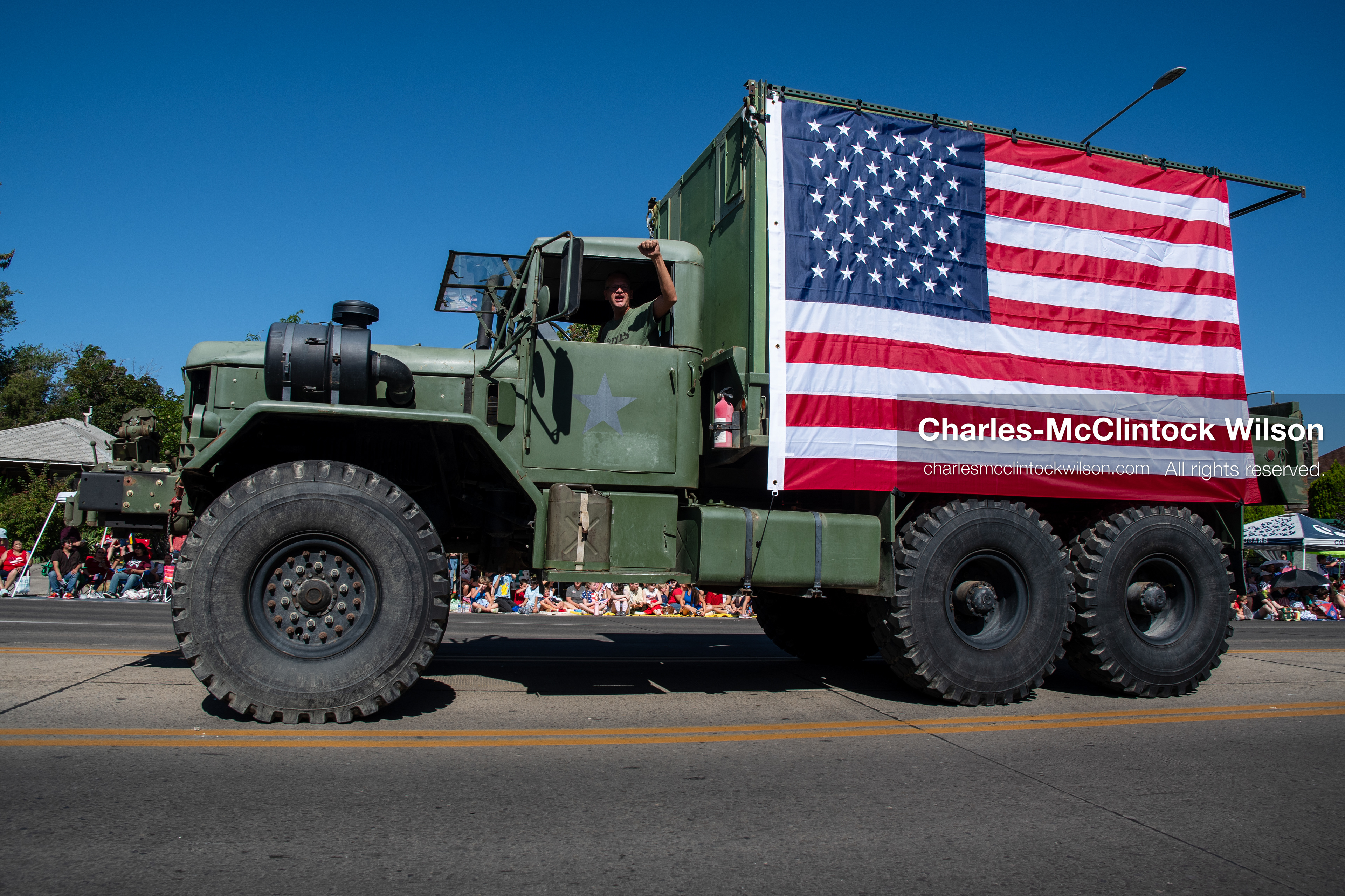 July 4, 2026, Provo, Utah, USA: A vintage military cargo truck draped with a large American flag drives along the route during America's Freedom Festival Grand Parade in Provo, Utah, Saturday, July 4, 2026. The annual Independence Day event features expanded programming to honor the 250th anniversary of United States independence. (Credit Image: © Charles-McClintock Wilson/ZUMA Press Wire)