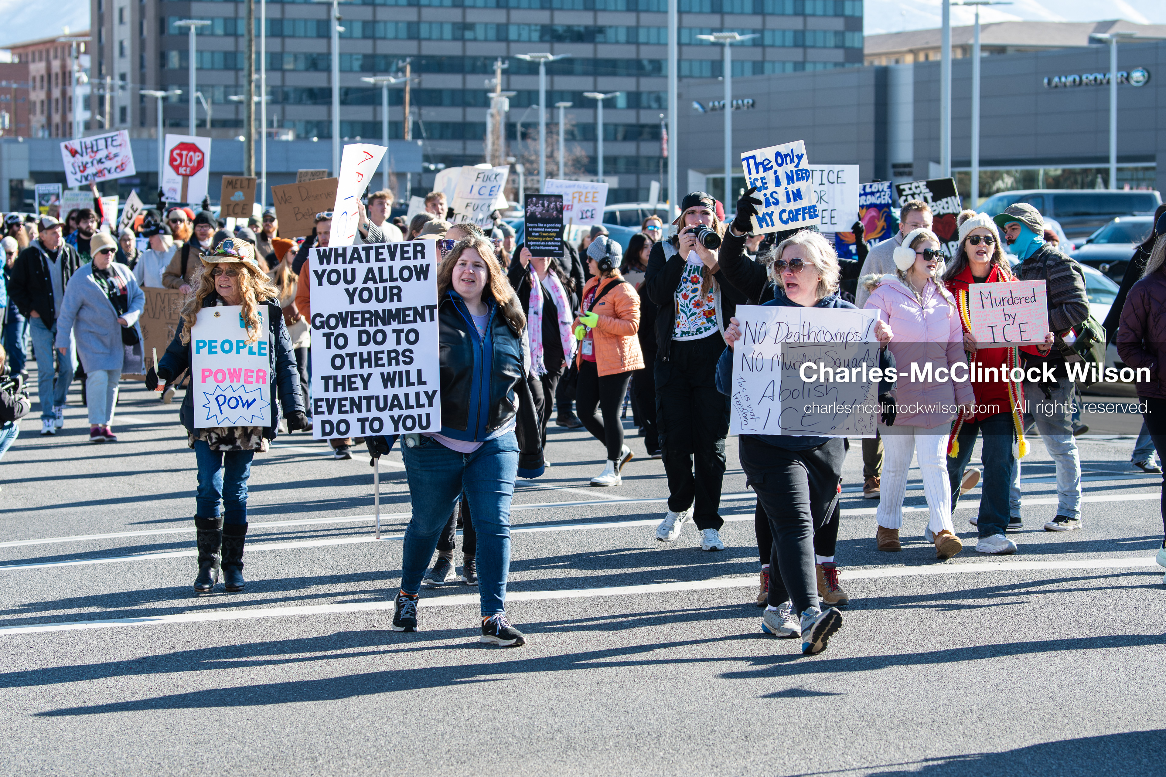 Salt Lake City, Utah, January 10, 2026: A group of demonstrators marches through downtown Salt Lake City during the ICE Out for Good protest, which began at Washington Square Park, with participants carrying signs and personal items as they walk together. (Credit Image: © Charles‑McClintock Wilson/ZUMA Press Wire)