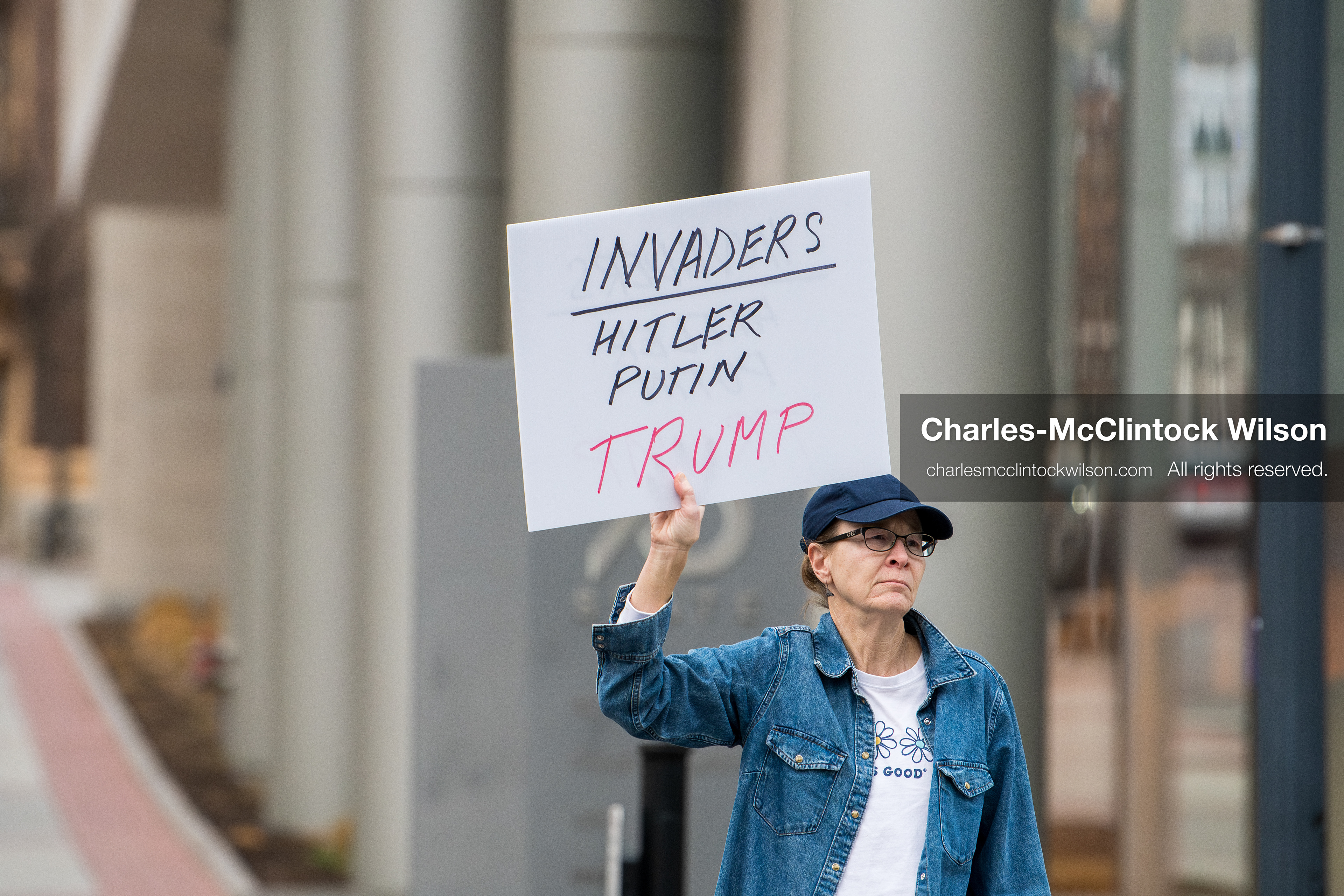 January 3, 2026, Salt Lake City, Utah, USA: A protester holds a sign during a demonstration against US action in Venezuela outside the Wallace Federal Building in Salt Lake City, Utah. The protest was part of a nationwide mobilization responding to recent military developments. (Credit Image: (c) Charles‑McClintock Wilson/ZUMA Press Wire)